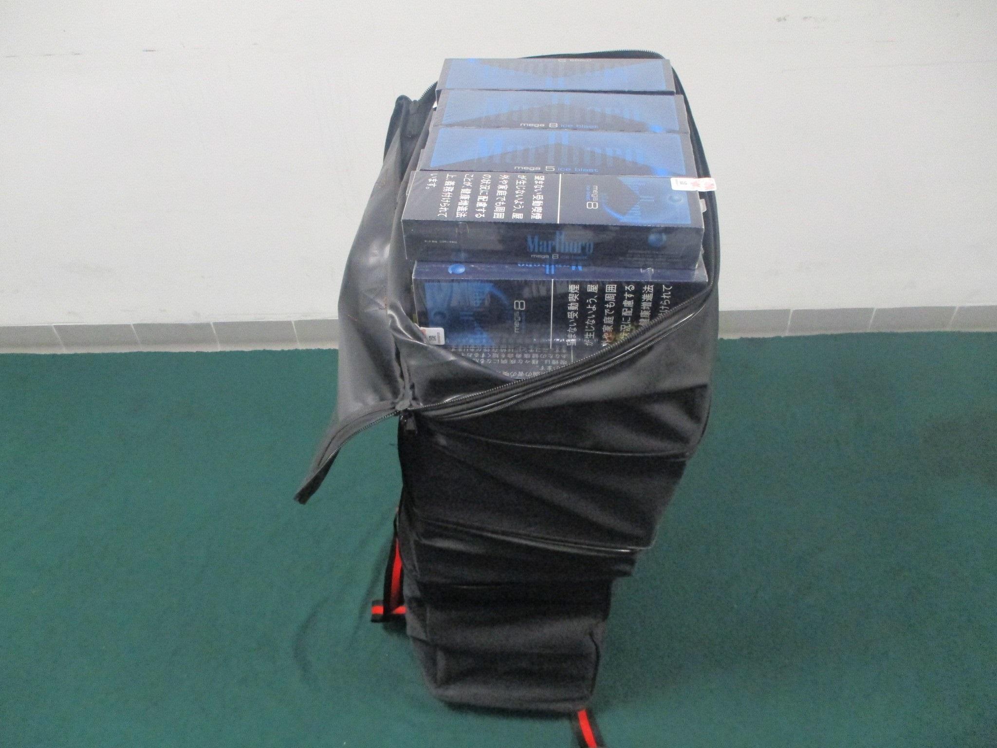 Three incoming passengers were sentenced to seven to eight months' imprisonment and fined $1,000 each by the West Kowloon Magistrates' Courts today (April 20) for importing and possessing duty-not-paid cigarettes and failing to declare them to Customs officers, in contravention of the Dutiable Commodities Ordinance. Photo shows the duty-not-paid cigarettes seized from the personal baggage of a 32-year-old incoming male passenger at Hong Kong-Zhuhai-Macao Bridge.