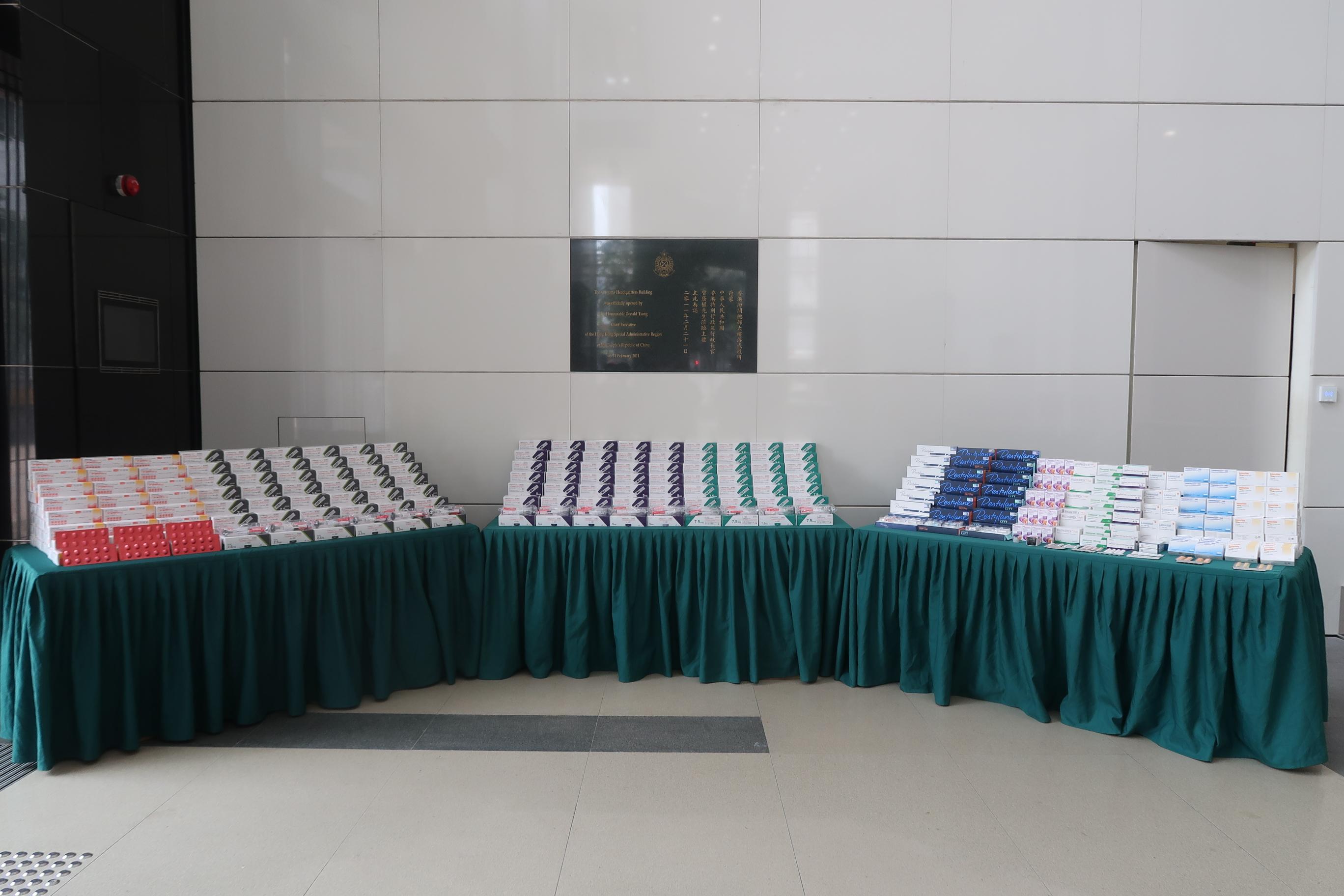 In view of the increasing demand of injections and medicines from society recently, Hong Kong Customs has strengthened enforcement against the smuggling of controlled injection substances and medicines. As a result, two related cases, with suspected controlled injection substances and pharmaceutical products worth over $39 million, were detected. Three persons were arrested. Photo shows the suspected controlled injection substances and pharmaceutical products seized.