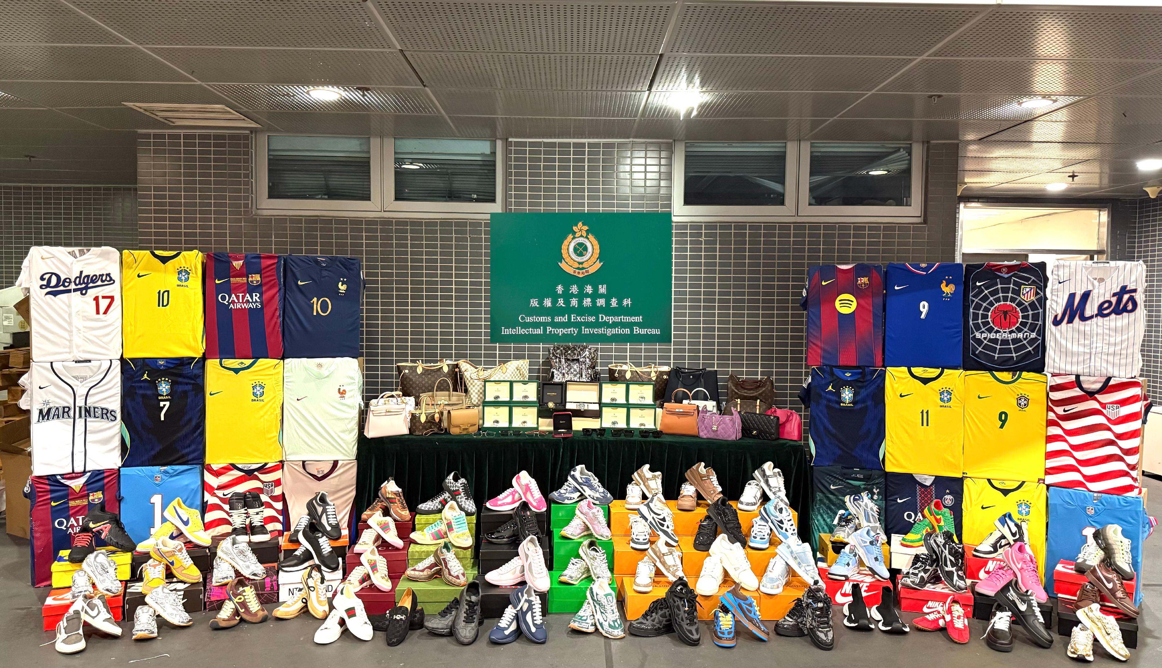 Hong Kong Customs on April 12 seized around 7 200 suspected counterfeit goods with a total estimated market value of around $2.4 million at the Shenzhen Bay Control Point. Photo shows the suspected counterfeit goods seized.