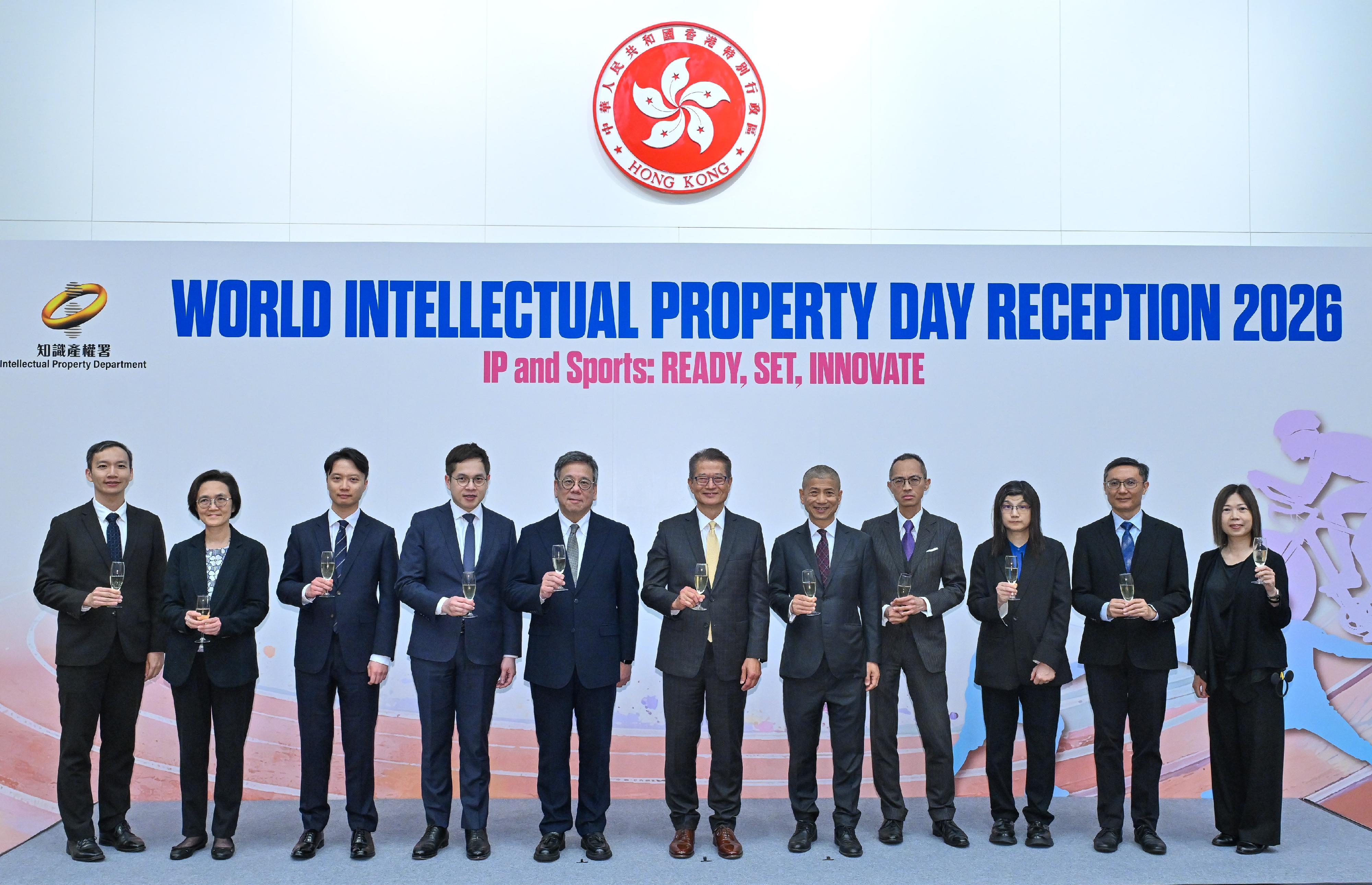 The Financial Secretary, Mr Paul Chan, attended the World Intellectual Property Day Reception 2026 today (April 21). Photo shows Mr Chan (centre); the Secretary for Commerce and Economic Development, Mr Algernon Yau (fifth left); the Director of Intellectual Property, Mr David Wong (fifth right), and other guests at the reception.