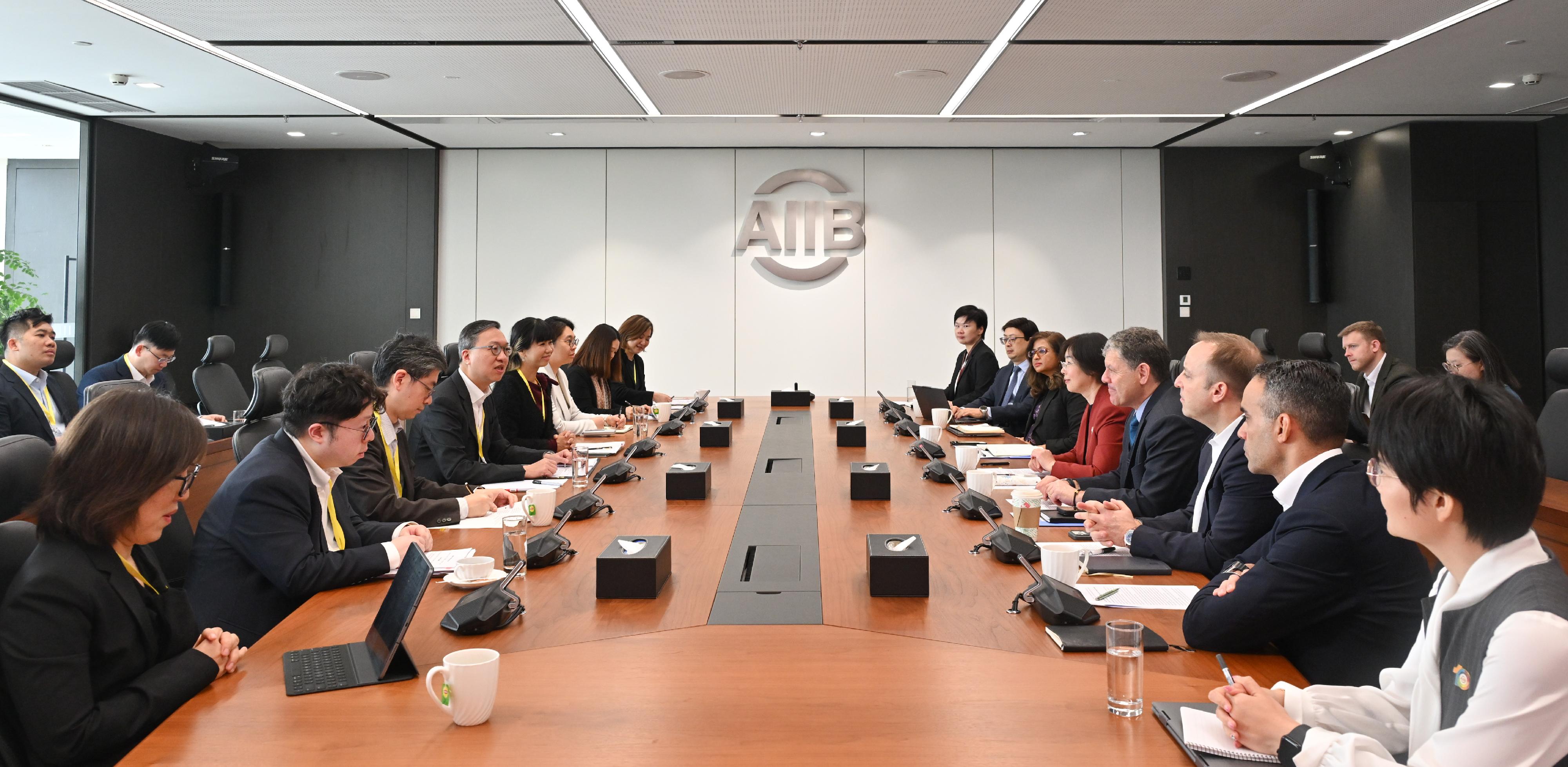 The Secretary for Justice, Mr Paul Lam, SC, continued his visit to Beijing on April 24. Photo shows Mr Lam (fourth left) meeting with the President of the Asian Infrastructure Investment Bank, Ms Zou Jiayi (fifth right). The Law Officer (International Law), Dr James Ding (third left), also attended the meeting.
