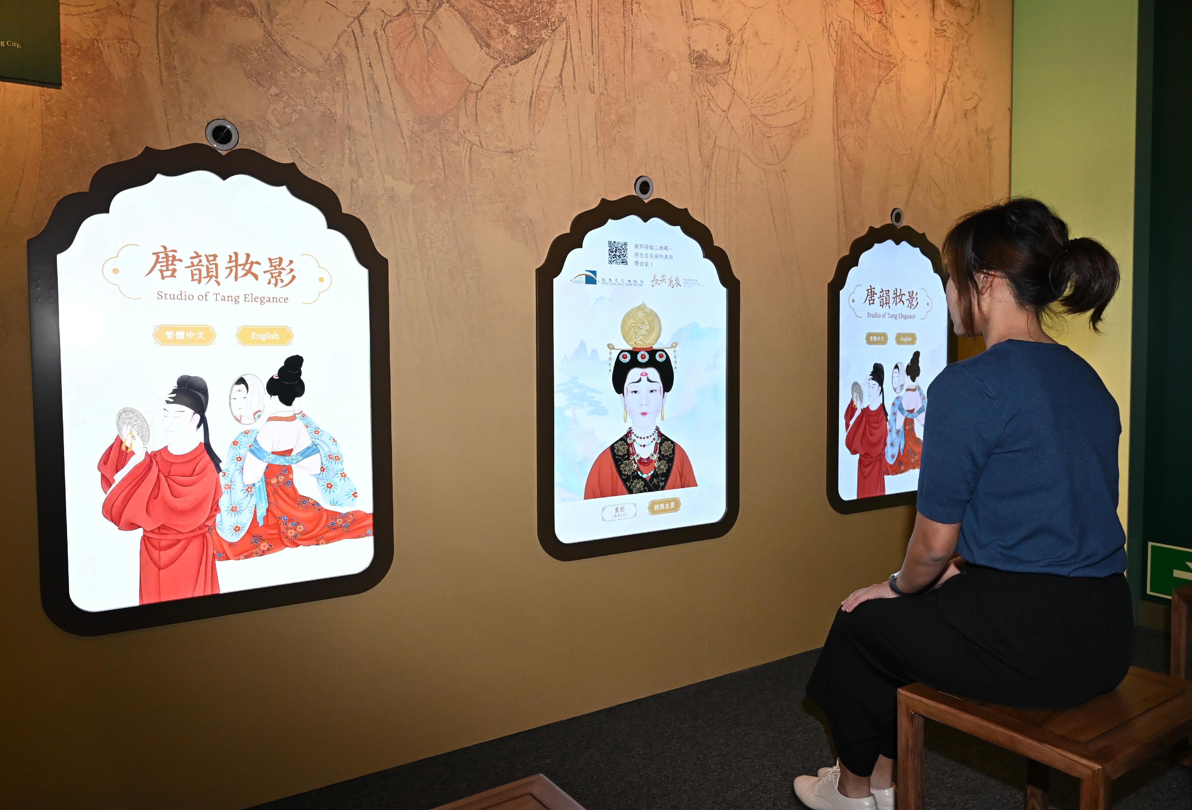 The Hong Kong Museum of History's "The Hong Kong Jockey Club Series: Prosperity and Magnificence - Civilisation of the Sui and Tang Dynasties in Shaanxi Province" exhibition will be open to the public from tomorrow (April 25). Photo shows a multimedia interactive game "Image Gallery of Tang's Dynasty" where visitors can learn about women's makeup in the Tang dynasty.