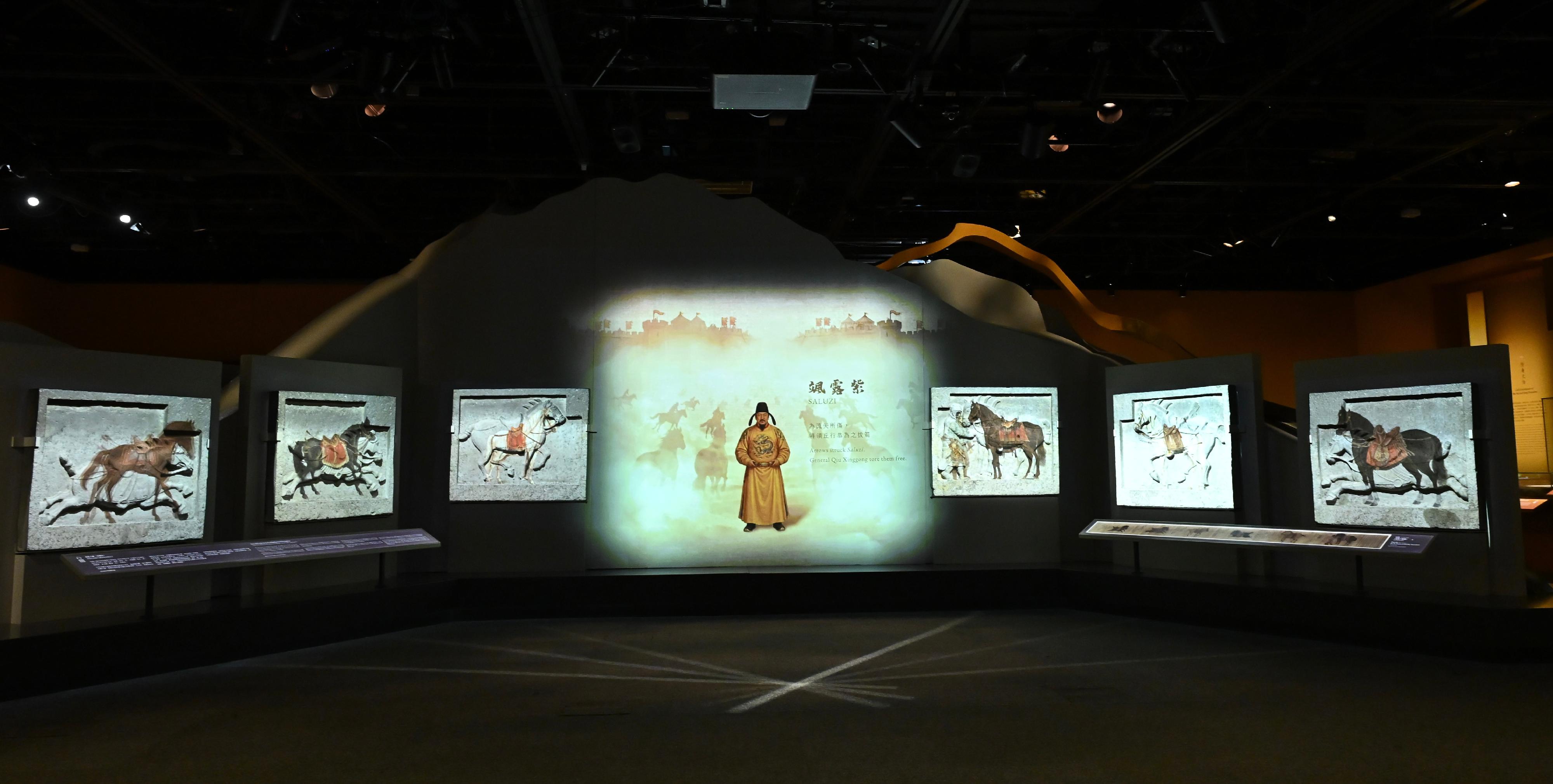 The Hong Kong Museum of History's "The Hong Kong Jockey Club Series: Prosperity and Magnificence - Civilisation of the Sui and Tang Dynasties in Shaanxi Province" exhibition will be open to the public from tomorrow (April 25). Photo shows stone reliefs of the Six Steeds of Zhaoling (replicas), originally unearthed from the Zhaoling Mausoleum, Liquan County, Xianyang of Shaanxi Province, which commemorate the six warhorses ridden by Emperor Taizong of Tang (Li Shimin) during his campaigns, showcasing the exquisite craftsmanship of Tang Dynasty sculpture. The exhibition uses multimedia projection on stone reliefs to vividly present the stories of the horses on the battlefield to visitors.
