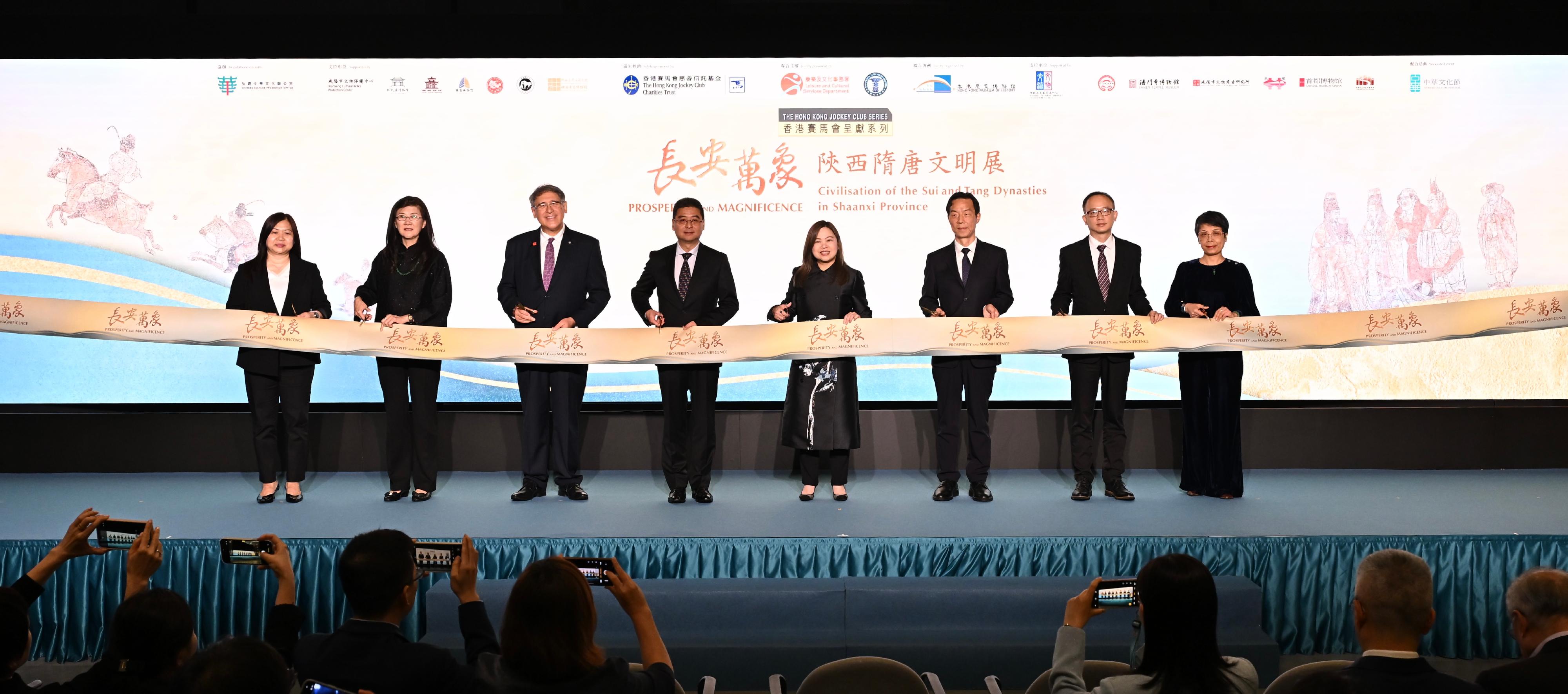 The opening ceremony of "The Hong Kong Jockey Club Series: Prosperity and Magnificence - Civilisation of the Sui and Tang Dynasties in Shaanxi Province" exhibition was held today (April 24) at the Hong Kong Museum of History. Photo shows officiating guests the Secretary for Culture, Sports and Tourism, Miss Rosanna Law (fourth right); Deputy Commissioner of the Ministry of Foreign Affairs of the People's Republic of China in the Hong Kong Special Administrative Region Mr Hua You (fourth left); Deputy Director of the Shaanxi Provincial Cultural Heritage Administration Mr Wang Runlu (third right); Deputy Chairman of the Hong Kong Jockey Club Mr Lester Huang (third left); Deputy Director-General of the Department of Publicity, Cultural and Sports Affairs of the Liaison Office of the Central People's Government in the Hong Kong Special Administrative Region Mr Lin Nan (second right); member of the Working Group on Patriotic Education under the Constitution and Basic Law Promotion Steering Committee Ms Melissa Pang (second left); the Acting Director of Leisure and Cultural Services, Miss Eve Tam (first right); and the Museum Director of the HKMH, Ms Joyce Ho (first left), at the ceremony.