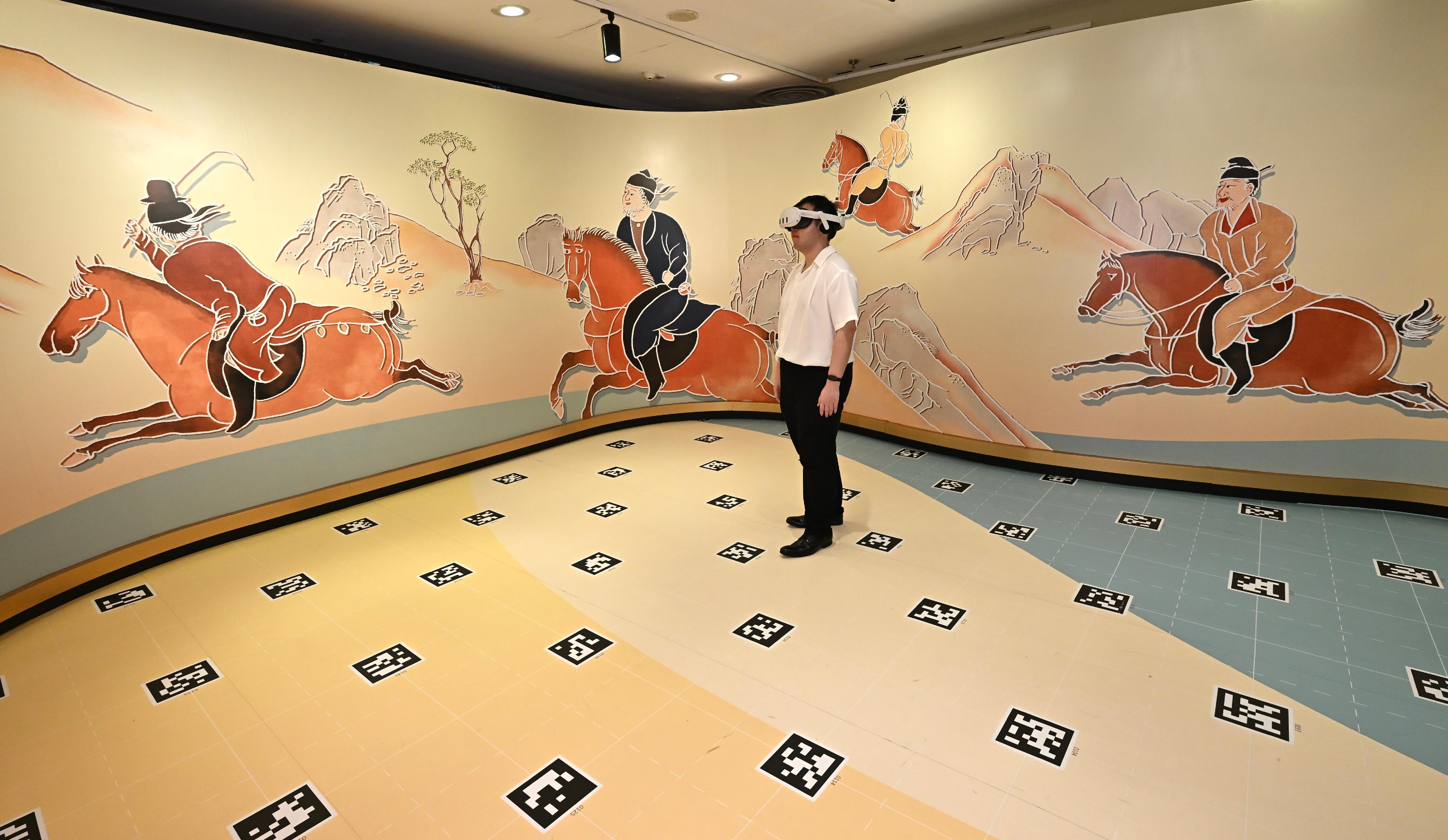 The Hong Kong Museum of History's "The Hong Kong Jockey Club Series: Prosperity and Magnificence - Civilisation of the Sui and Tang Dynasties in Shaanxi Province" exhibition will be open to the public from tomorrow (April 25). Photo shows a virtual reality experience "Beyond the Mural: Echoes of the Tang Dynasty" in which visitors can travel back to the vibrant and magnificent Chang'an with Li Guangren, the second son of Crown Prince Zhanghuai, Li Xian, to join an exciting polo match; soar over the grand Chang'an City; and explore the tomb of Crown Prince Zhanghuai.
