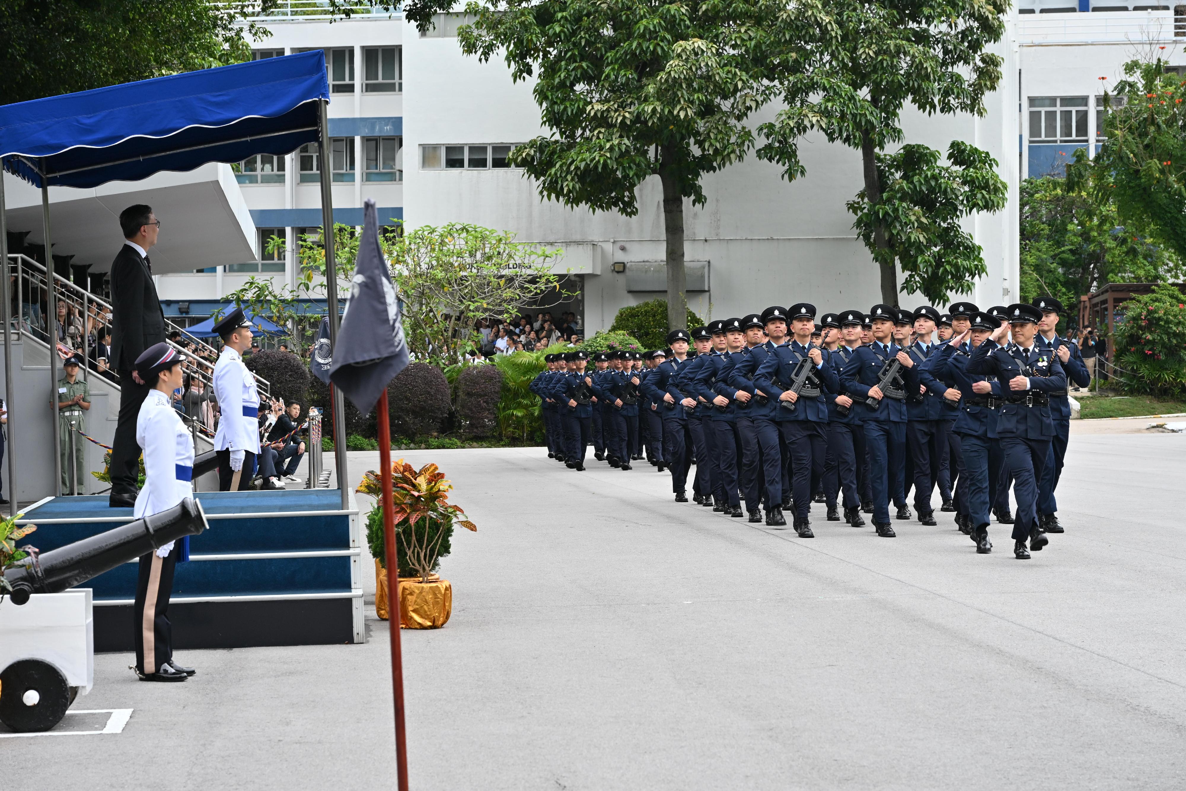 The Secretary for Justice, Mr Paul Lam, SC, today (April 25) inspects a passing-out parade of 34 probationary inspectors and 165 recruit police constables at the Hong Kong Police College.