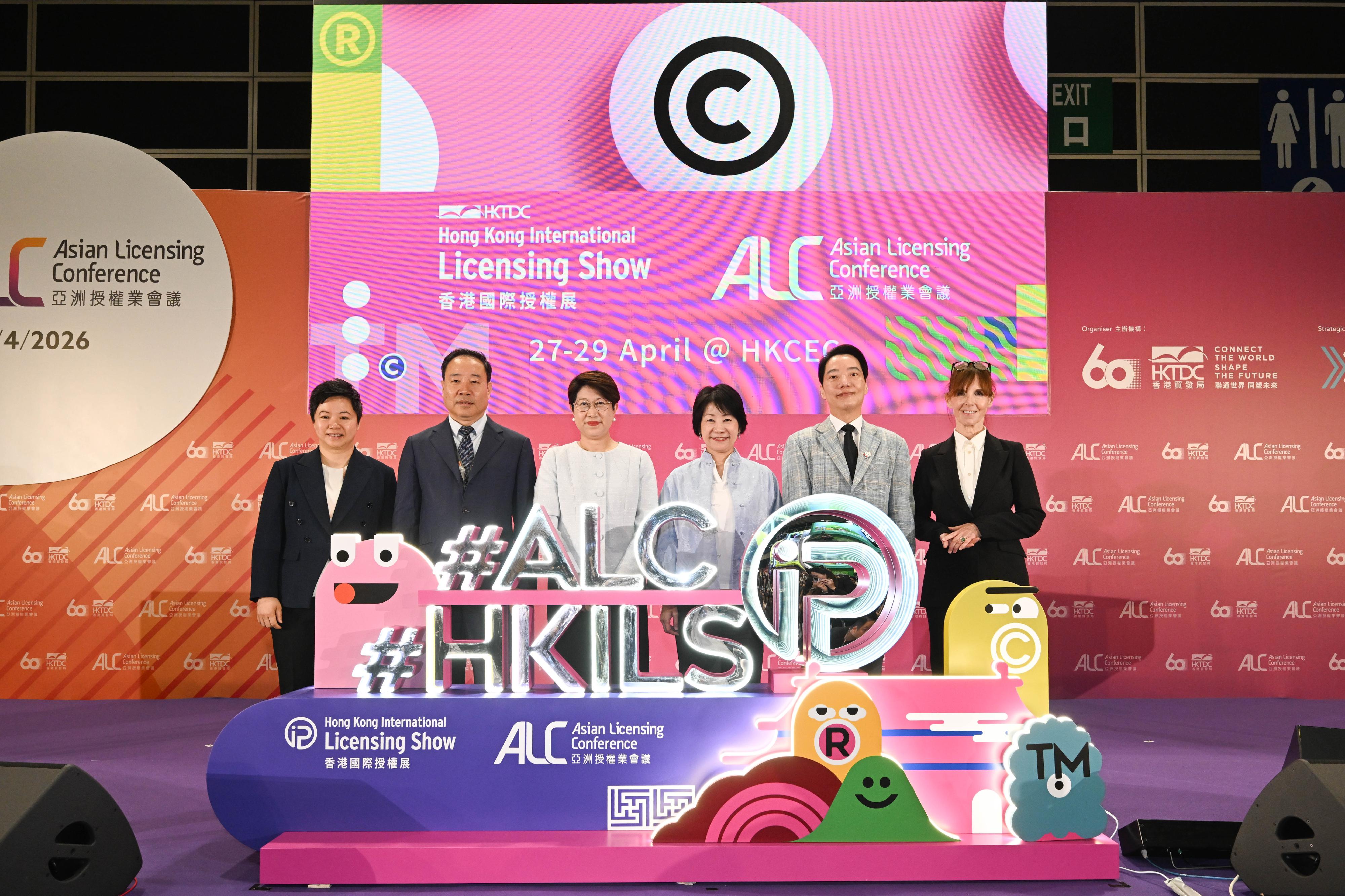 The Cultural and Creative Industries Development Agency under the Culture, Sports and Tourism Bureau sponsored the seventh Design Licensing and Business (DLAB) Support Scheme, organised by the Innovative Entrepreneur Association, to participate in the Hong Kong International Licensing Show 2026 and set up the DLAB Hong Kong Pavilion therein. Running for three days from today (April 27) to April 29, the Hong Kong Pavilion showcases original creations from 39 selected local design companies. Photo shows the Permanent Secretary for Culture, Sports and Tourism, Ms Vivian Sum (third right); the Executive Director of the Hong Kong Trade Development Council, Ms Sophia Chong (third left); the Commissioner for Cultural and Creative Industries, Miss Drew Lai (first left), and other guests officiating at the opening ceremony of the Licensing Show.