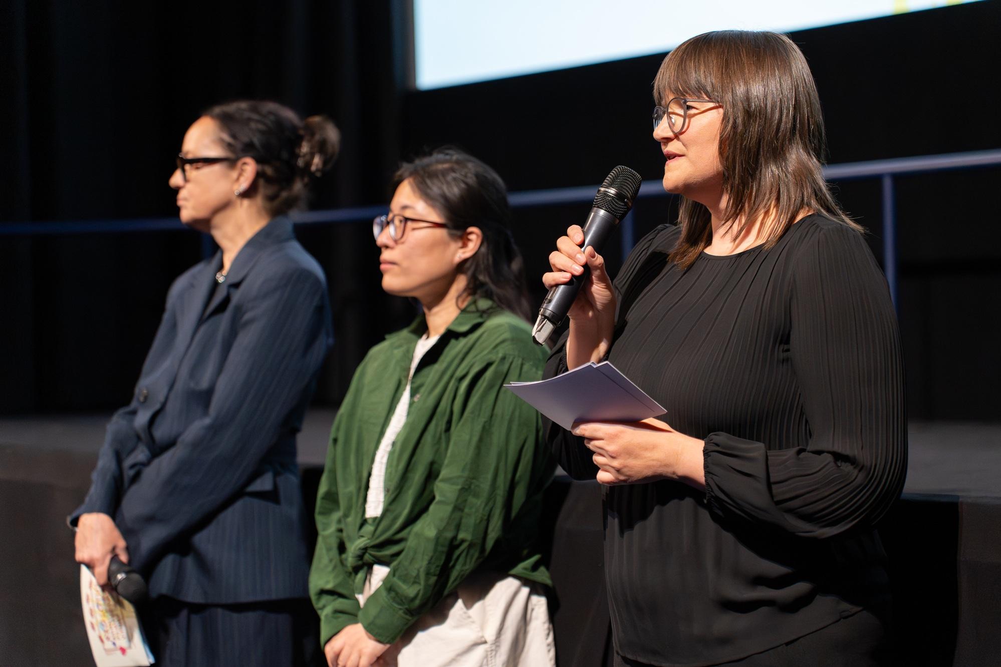 The Hong Kong Economic and Trade Office, Berlin (HKETO Berlin) supported the 5th Red Lotus Asian Film Festival in Vienna, Austria. Photo shows the Head of Public Relations of HKETO Berlin, Ms Stephanie Pall (right), speaking before the screening of the opening film "The Shadow's Edge" on April 25 (Vienna time).