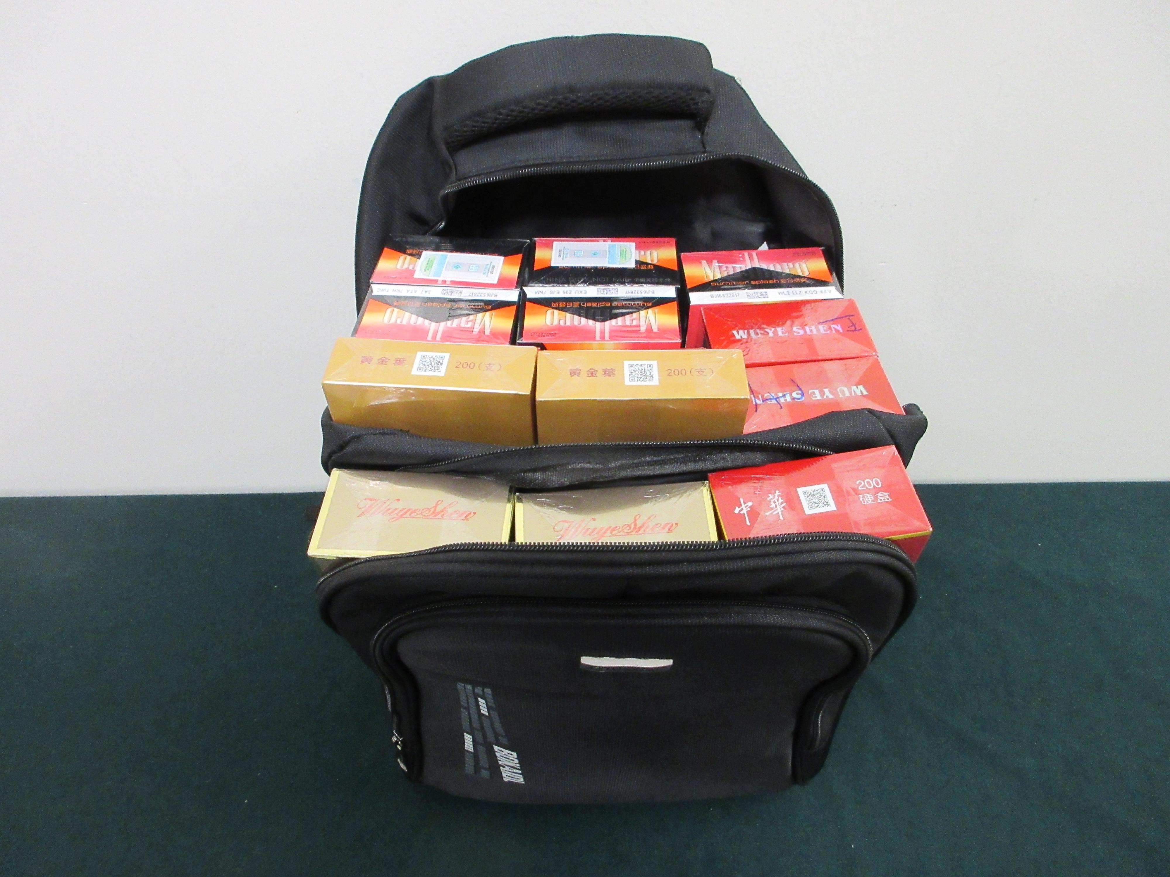 An incoming passenger was sentenced to four weeks' imprisonment with a fine of $1,000 by the Fanling Magistrates' Courts today (April 28) for possessing duty-not-paid cigarettes and failing to declare them to Customs officers, in contravention of the Dutiable Commodities Ordinance.  Photo shows the duty-not-paid cigarettes seized.
