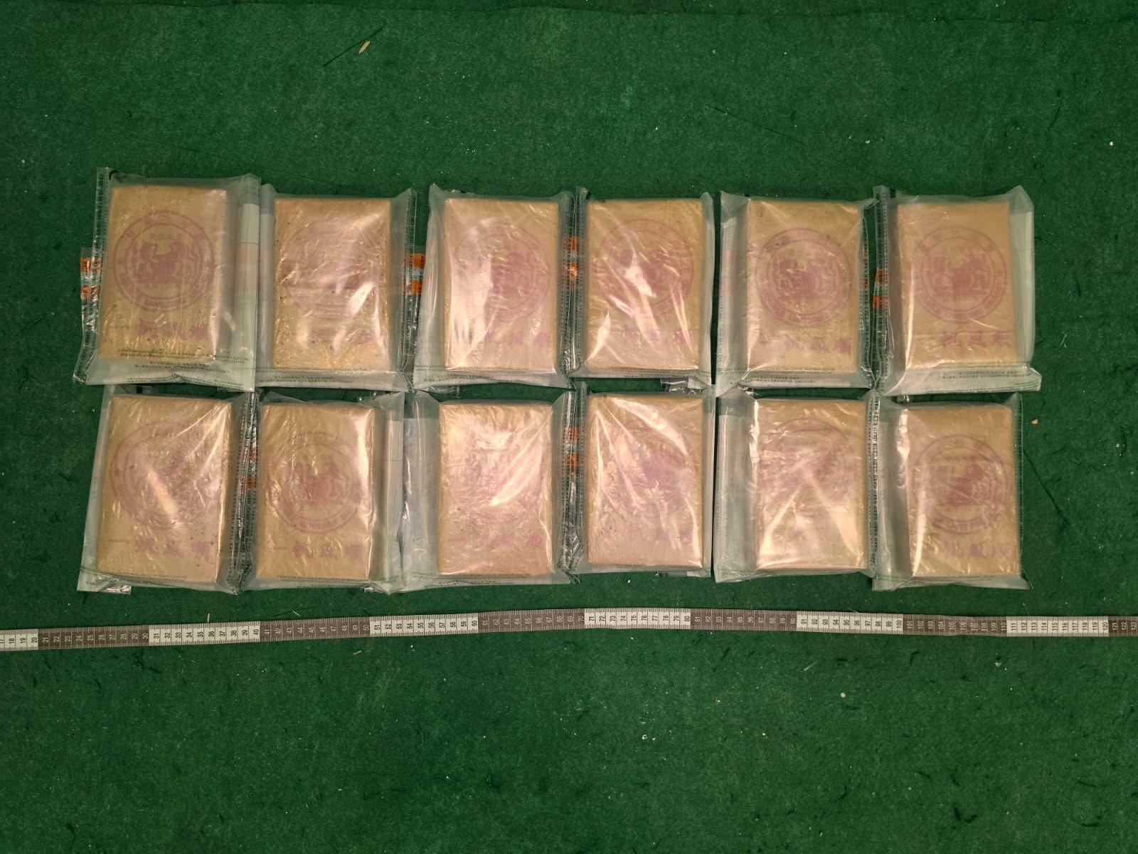 Hong Kong Customs yesterday (May 2) and today (May 3) detected three drug trafficking cases involving passengers at Hong Kong International Airport and seized about 11.6 kilograms of suspected heroin and 6 kg of suspected cannabis buds, with a total estimated market value of about $8.3 million. Photo shows the suspected heroin seized in the third case.