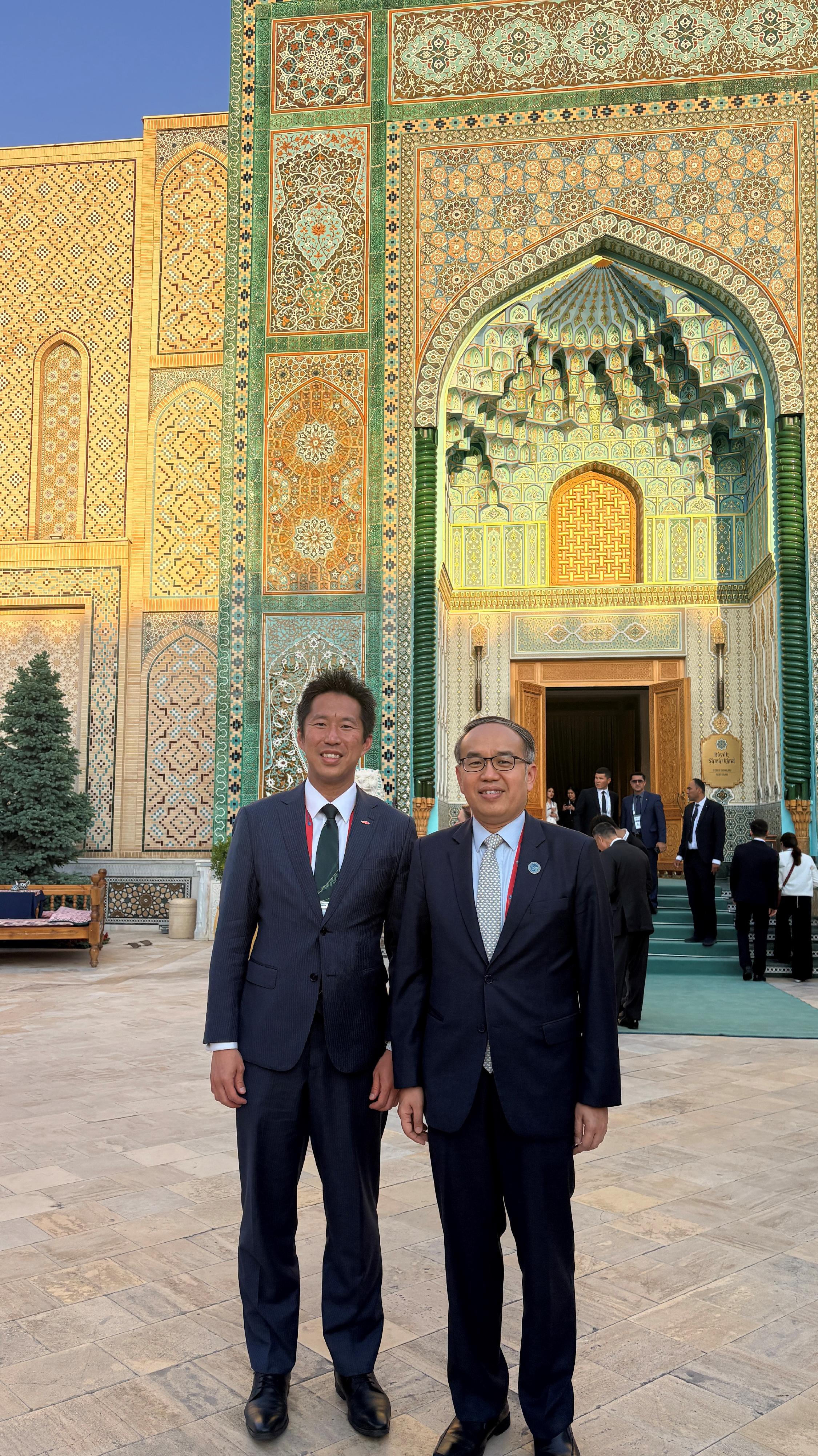 The Secretary for Financial Services and the Treasury, Mr Christopher Hui, attended the 59th Annual Meeting of the Board of Governors of the Asian Development Bank held in Samarkand, Uzbekistan, on May 4 (Samarkand time). Photo shows Mr Hui (right) with the Director of the Hong Kong Economic and Trade Office in Berlin, Mr Indiana Wong (left), during a reception and gala dinner organised by Uzbekistan, the host country of the Annual Meeting.
