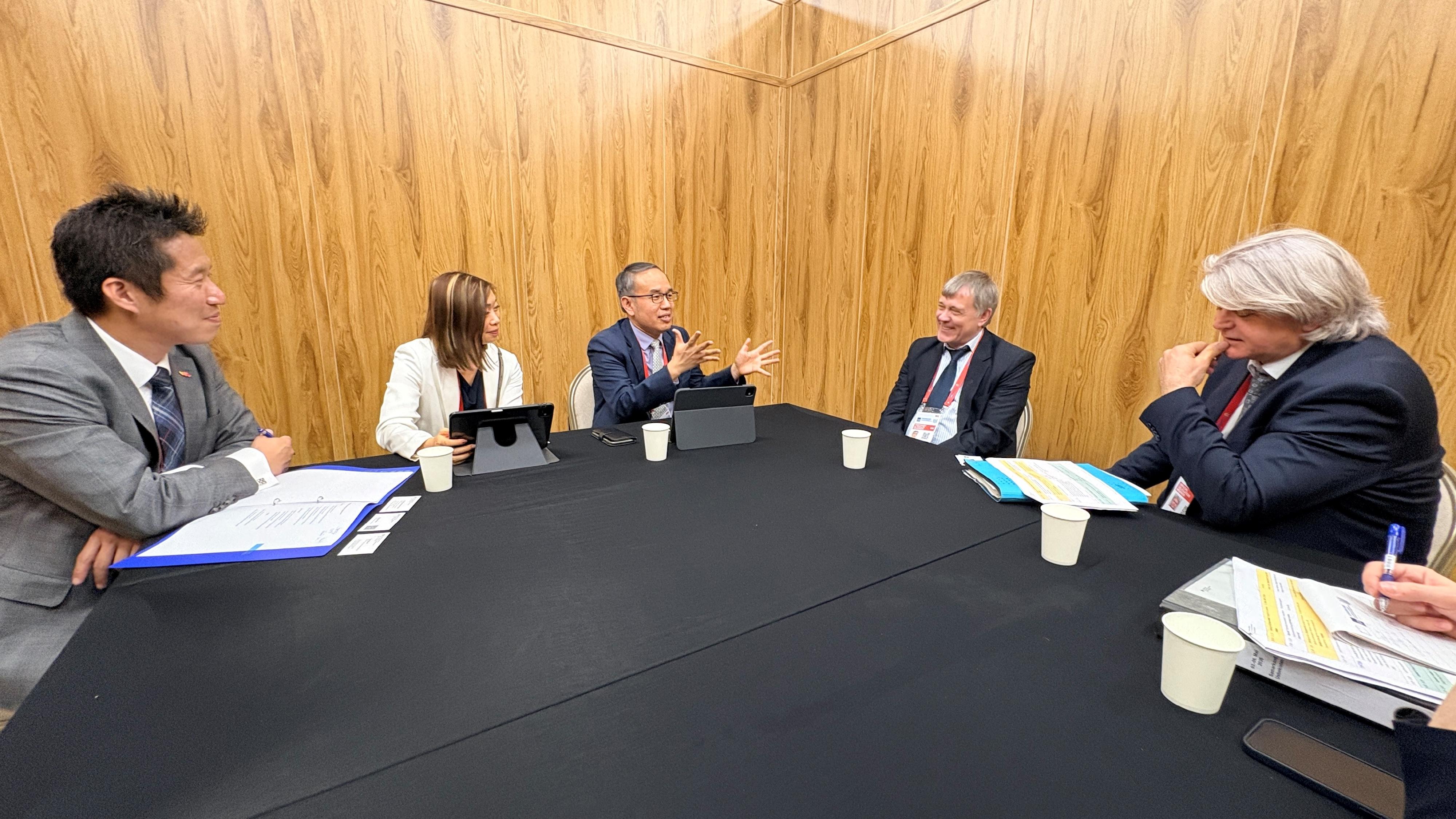 The Secretary for Financial Services and the Treasury, Mr Christopher Hui, attended the 59th Annual Meeting of the Board of Governors of the Asian Development Bank held in Samarkand, Uzbekistan, on May 5 (Samarkand time). Photo shows Mr Hui (centre) meeting with the Head of Division (Regional Development Banks) of the Federal Ministry for Economic Cooperation and Development, Germany, Dr Wolfram Morgenroth-Klein (second right), on the sidelines. Next to Mr Hui is the Director of the Hong Kong Economic and Trade Office in Berlin, Mr Indiana Wong (first left).

