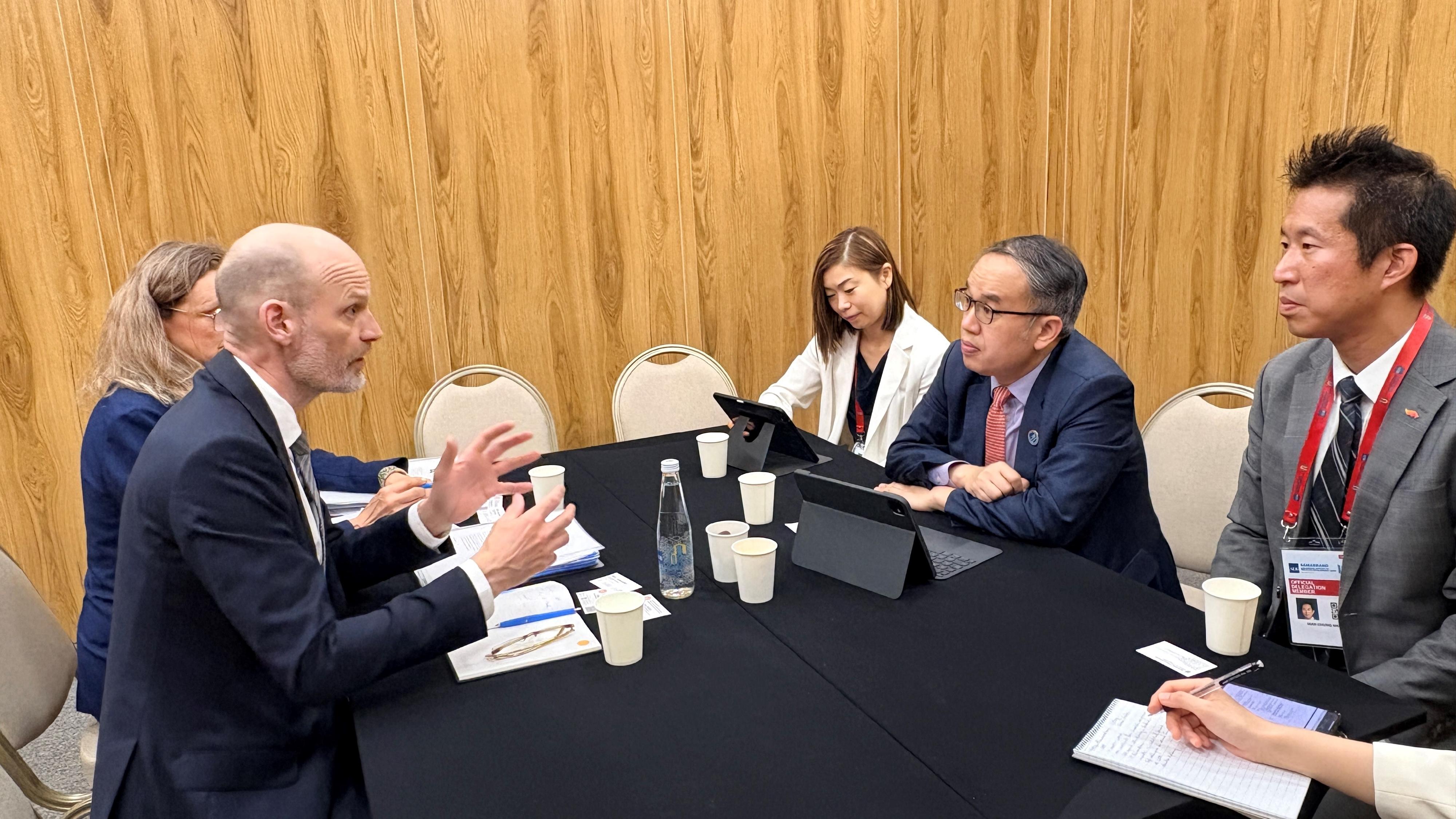 The Secretary for Financial Services and the Treasury, Mr Christopher Hui, attended the 59th Annual Meeting of the Board of Governors of the Asian Development Bank held in Samarkand, Uzbekistan, on May 5 (Samarkand time). Photo shows Mr Hui (second right) meeting with the Deputy Director-General and Head of Department for Multilateral Development Banks, Sustainability and Climate of Ministry for Foreign Affairs, Sweden, Mr Tobias Axerup (second left), on the sidelines. Next to Mr Hui is the Director of the Hong Kong Economic and Trade Office in Berlin, Mr Indiana Wong (first right).