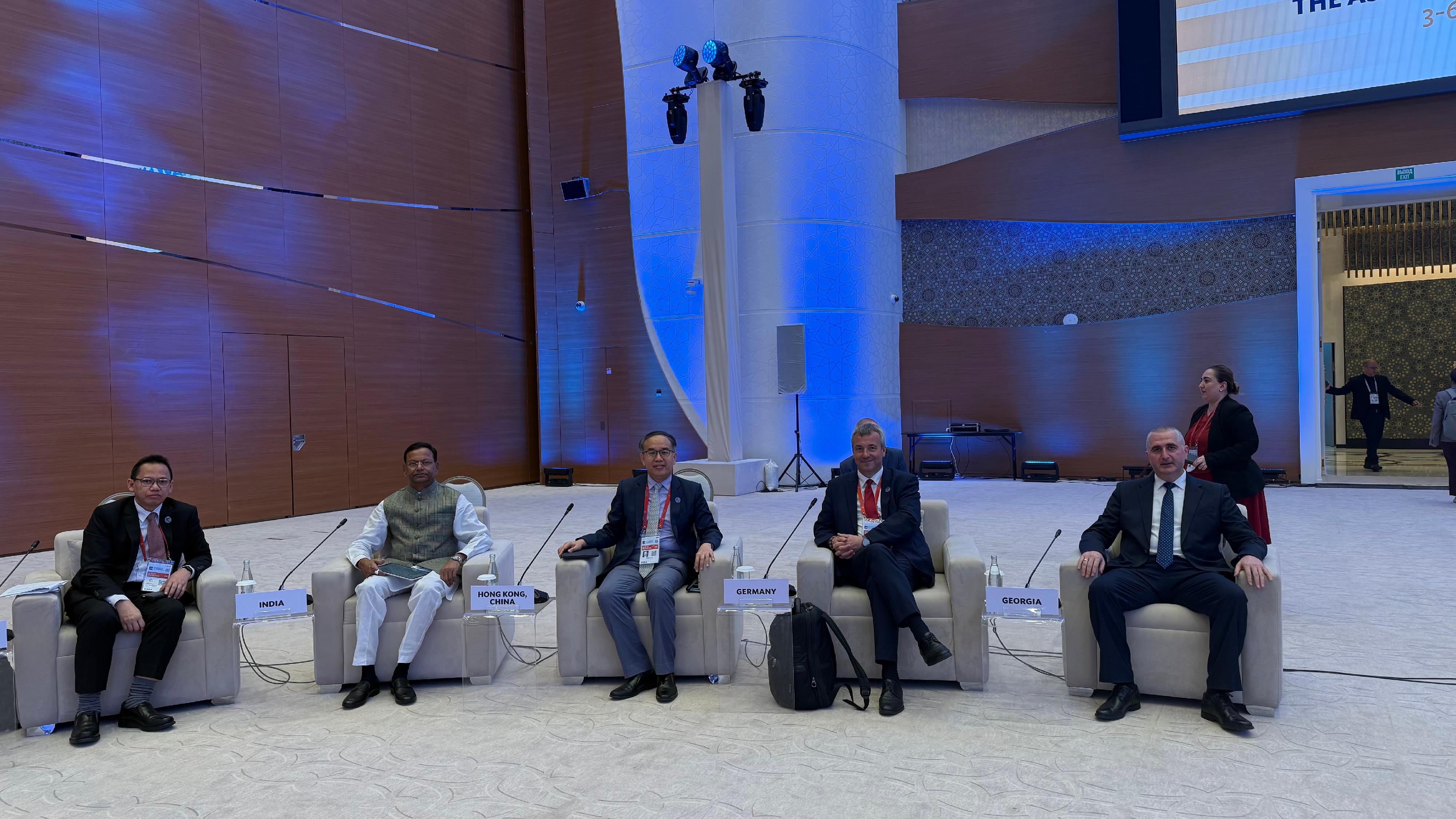 The Secretary for Financial Services and the Treasury, Mr Christopher Hui, attended the Governors' Plenary at the 59th Annual Meeting of the Board of Governors of the Asian Development Bank held in Samarkand, Uzbekistan, on May 5 (Samarkand time). Photo shows Mr Hui (centre) with representatives of other governors before the meeting.
