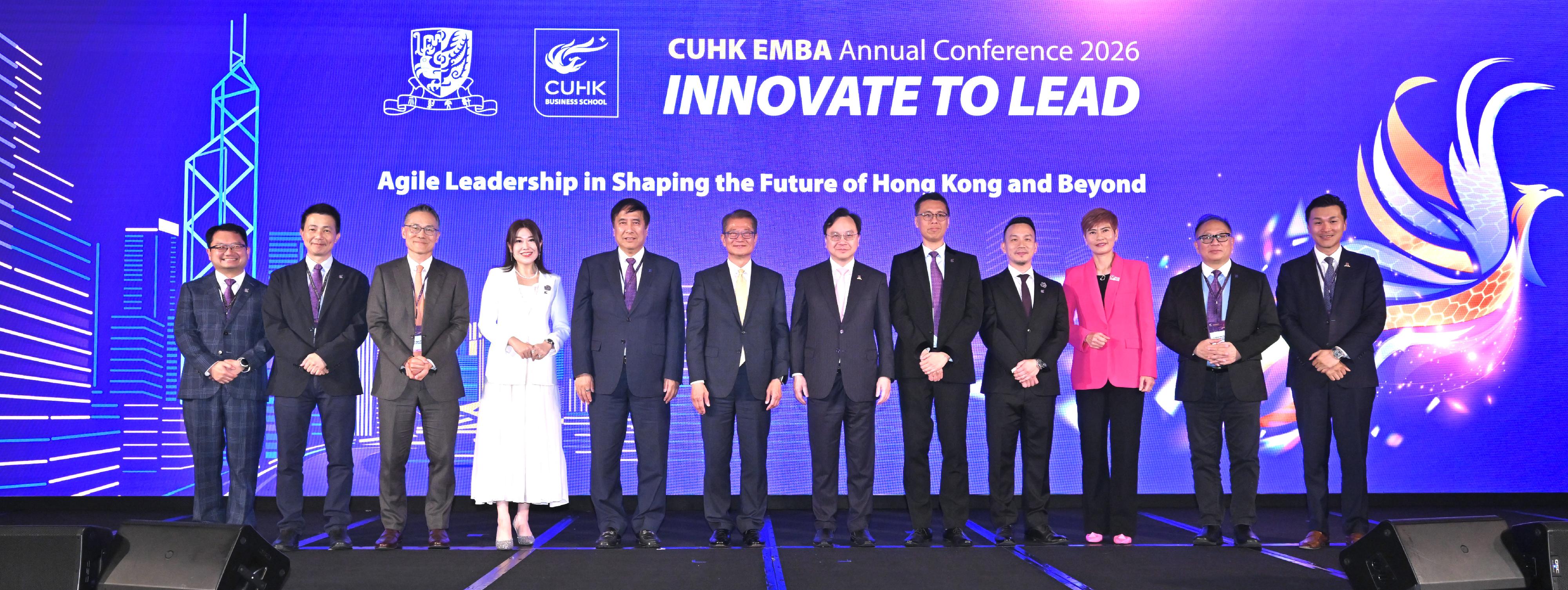 The Financial Secretary, Mr Paul Chan, attended the CUHK EMBA Annual Conference 2026 today (May 9). Photo shows Mr Chan (sixth left) in a group photo with Vice-Chancellor and President of the Chinese University of Hong Kong (CUHK), Professor Dennis Lo (sixth right), Dean of the CUHK Business School, Professor Lin Zhou (fifth right), and other guests.