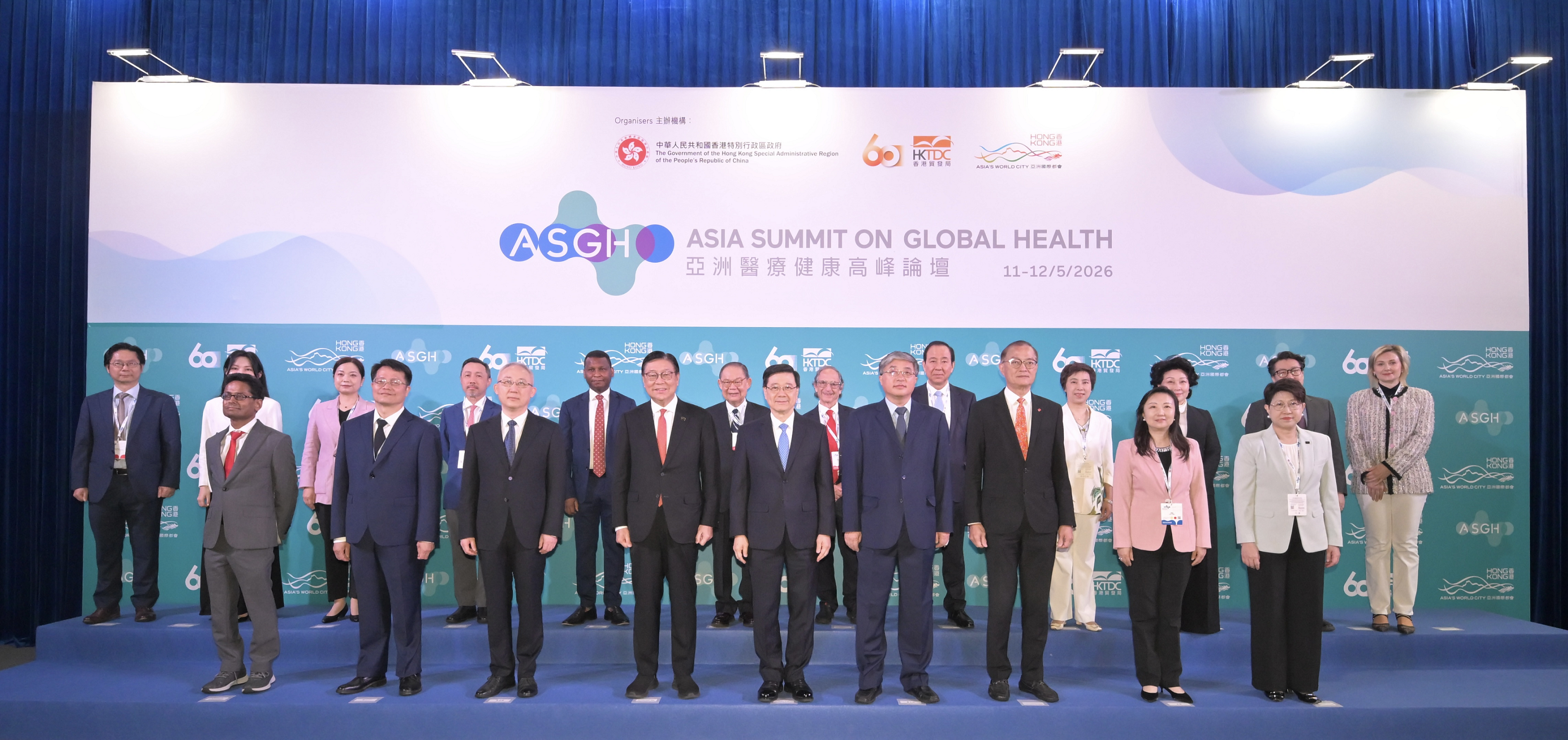 The Chief Executive, Mr John Lee, attended the Asia Summit on Global Health today (May 11). Photo shows (front row, from third left) Deputy Commissioner of the Office of the Commissioner of the Ministry of Foreign Affairs of the People's Republic of China in the Hong Kong Special Administrative Region (HKSAR) Mr Li Yongsheng; the Chairman of the Hong Kong Trade Development Council, Professor Frederick Ma; Mr Lee; Deputy Director of the Liaison Office of the Central People's Government in the HKSAR Mr Luo Yonggang; the Secretary for Health, Professor Lo Chung-mau, and other guests at the event.  
