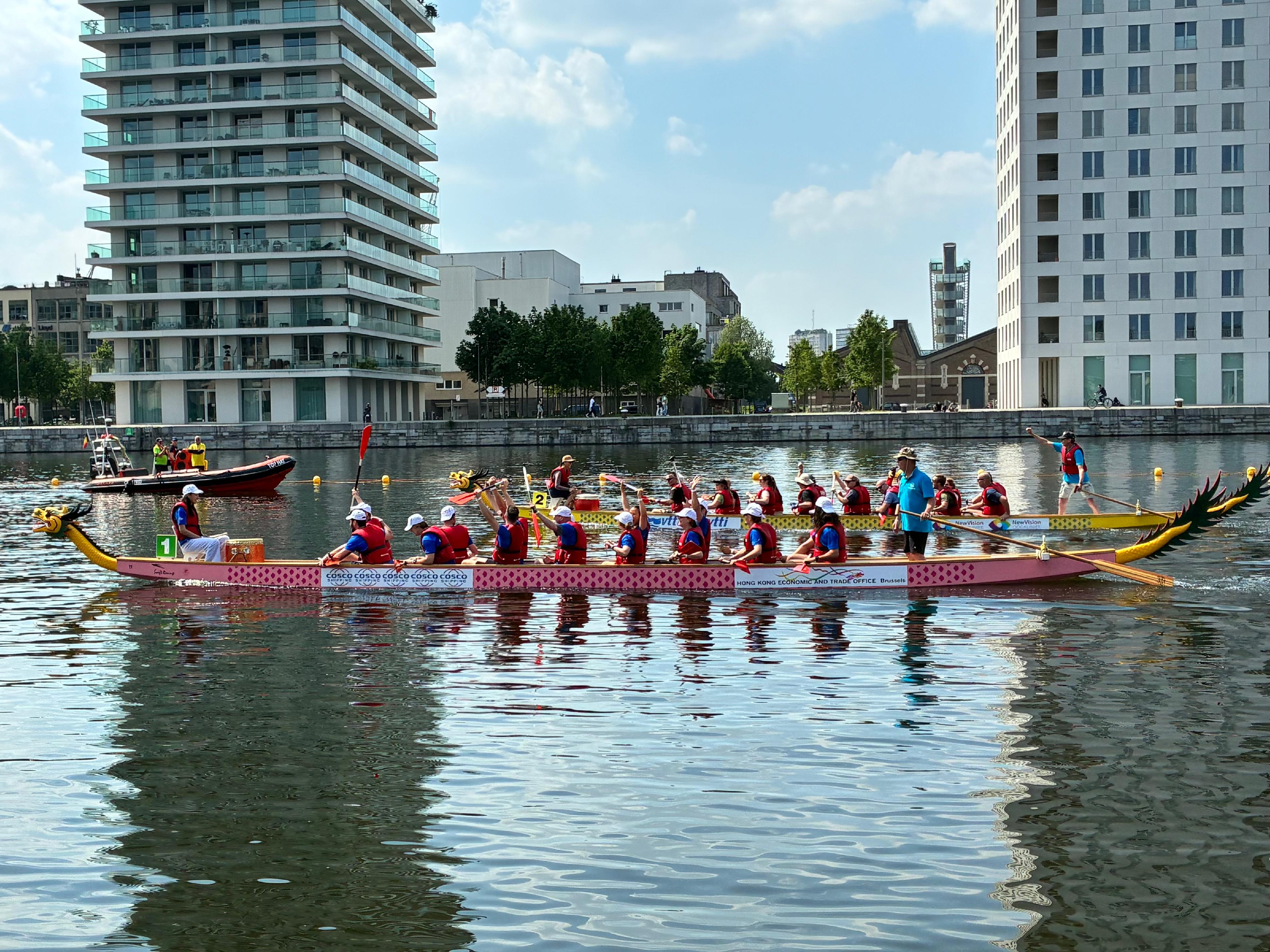 Hong Kong Economic and Trade Office in Brussels supported the 12th Hong Kong Dragon Boat Festival (the Festival) in Antwerp, Belgium. Photo shows members of the "Hong Kong Dragons" dragon boat team racing at the Festival on May 9 (Antwerp time).