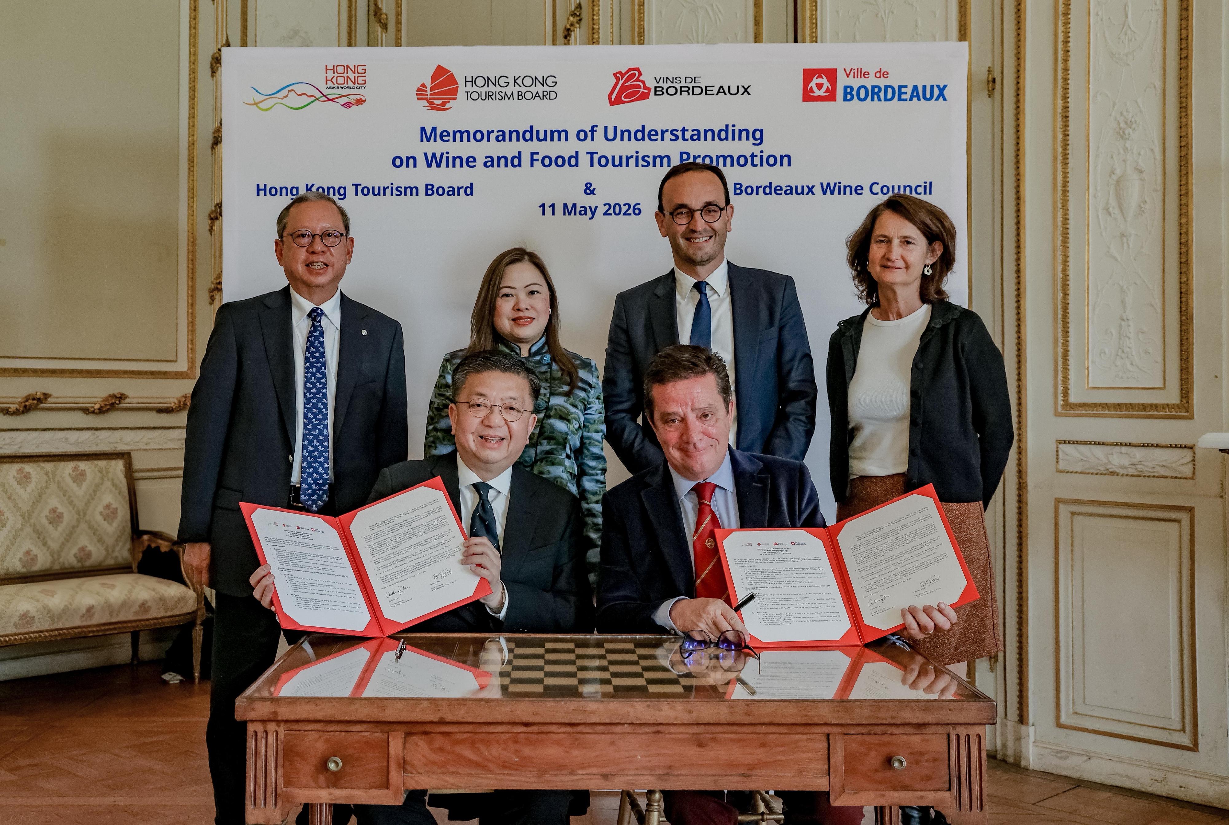 The Secretary for Culture, Sports and Tourism, Miss Rosanna Law, accompanied by the Chairman of the Hong Kong Tourism Board (HKTB), Dr Peter Lam, yesterday (May 11, Bordeaux time) witnessed the signing of the Memorandum of Understanding on Wine and Food Tourism Promotion between the HKTB and the Conseil Interprofessionnel du Vin de Bordeaux (CIVB). Photo shows Miss Law (back row, second left); Dr Lam (back row, first left); the Mayor of Bordeaux, Mr Thomas Cazenave (back row, second right); member of Bordeaux City Hall Ms Laure de Lambert Compeyrot (back row, first right); the Exective Director of the HKTB, Mr Anthony Lau (front row, left); and the Vice President of the CIVB, Mr Philippe Tapie (front row, right), attending the signing ceremony.