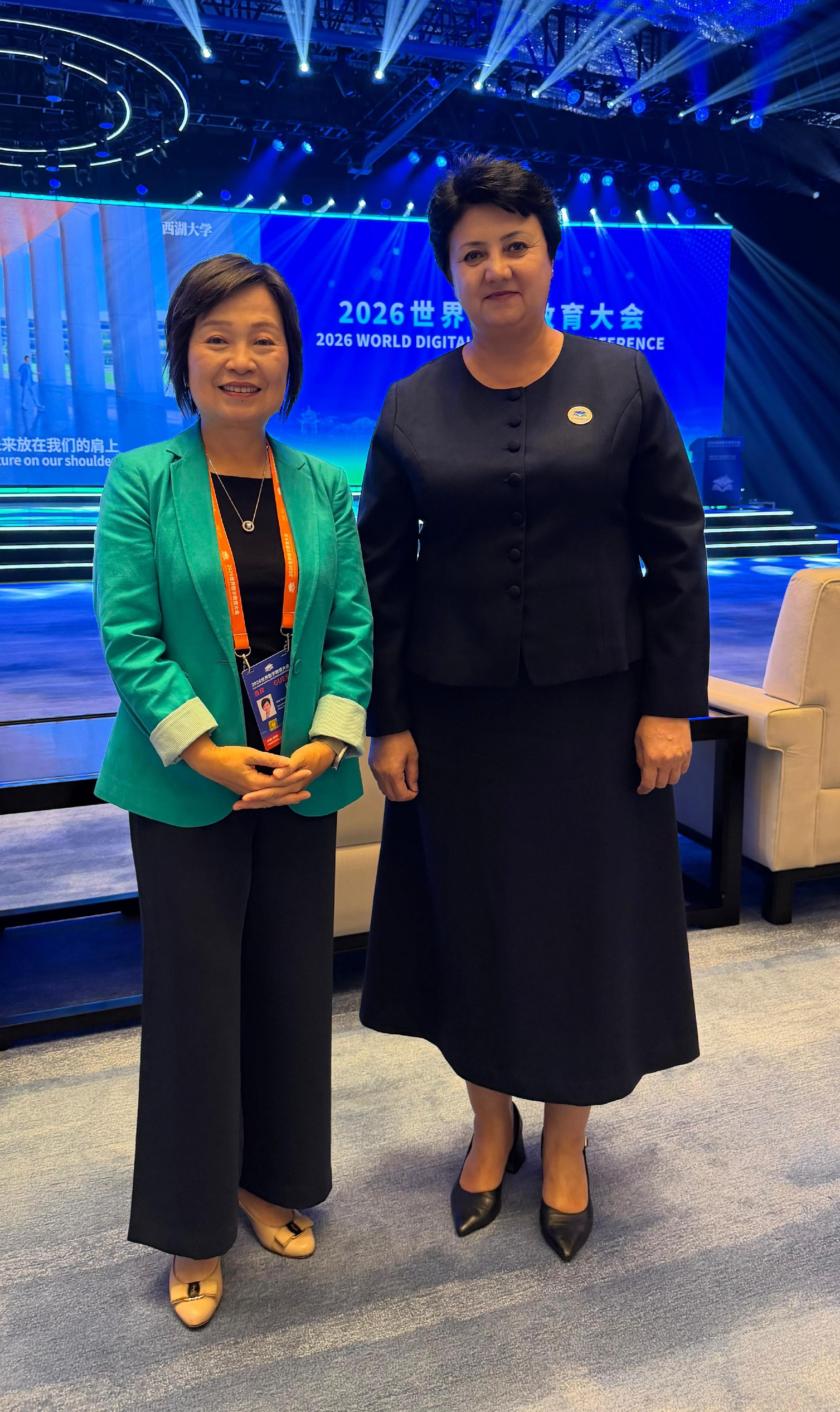 The Secretary for Education, Dr Choi Yuk-lin (left), attended the 2026 World Digital Education Conference in Hangzhou, Zhejiang, and met with Uzbekistan's Minister of Preschool and School Education, Ms Ezozkhon Karimova (right), yesterday (May 11). 