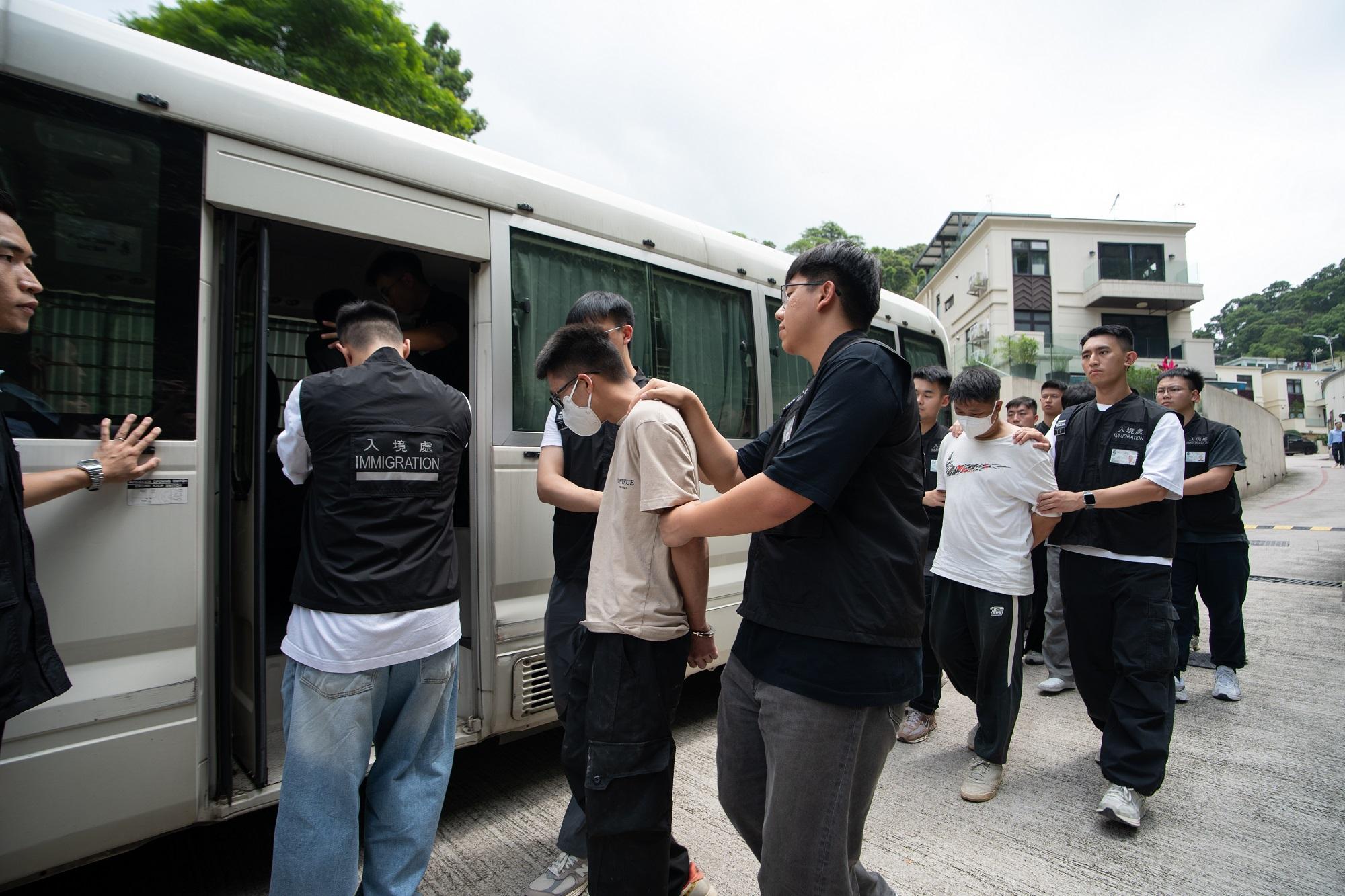 The Immigration Department mounted an anti-illegal worker operation codenamed "Contribute" today (May 12). Photo shows suspected illegal workers arrested during an operation.