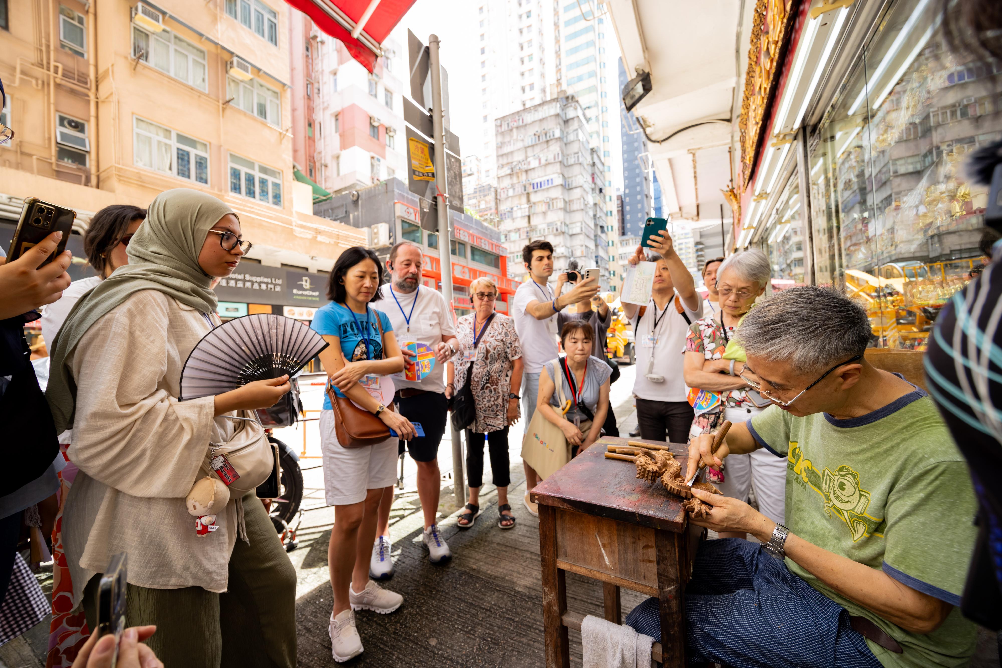 The Intangible Cultural Heritage Office of the Leisure and Cultural Services Department will organise the Hong Kong ICH Month 2026 in June. Registration for the public tours under the highlight programme, "The Hong Kong Jockey Club Series: ICH Highlight Tours", in eight handpicked districts featuring nine routes, will open on May 15 and 16. Photo shows the Wood Carving Technique, one of the ICH items in the route in Yau Tsim Mong District. Participants can learn about its making steps through ICH practitioners. 