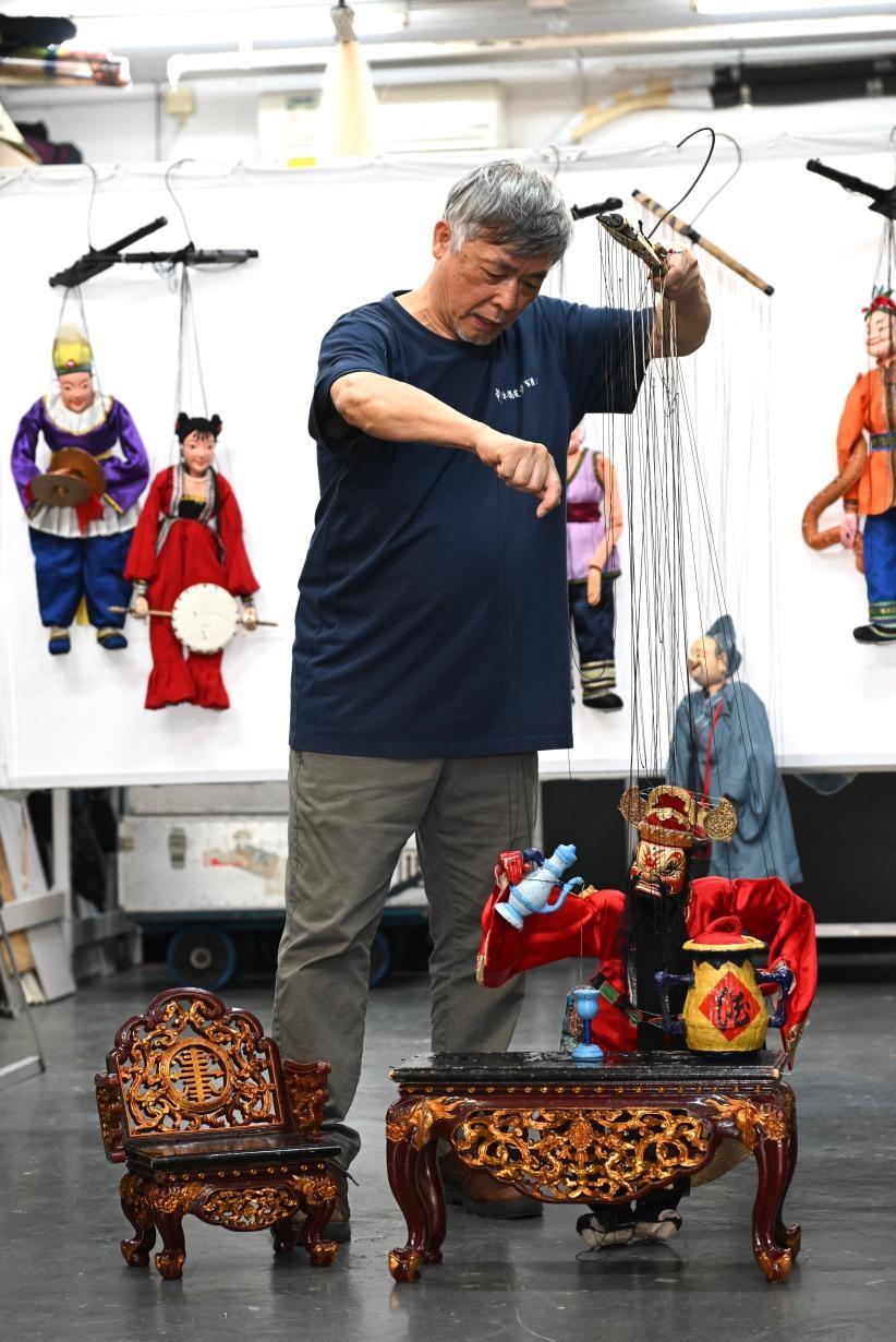 The Intangible Cultural Heritage Office of the Leisure and Cultural Services Department will organise the Hong Kong ICH Month 2026 in June. Registration for the public tours under the highlight programme, "The Hong Kong Jockey Club Series: ICH Highlight Tours", in eight handpicked districts featuring nine routes, will open on May 15 and 16. Photo shows the lifelike and captivating Puppetry, one of the ICH items in the route in Sham Shui Po District.