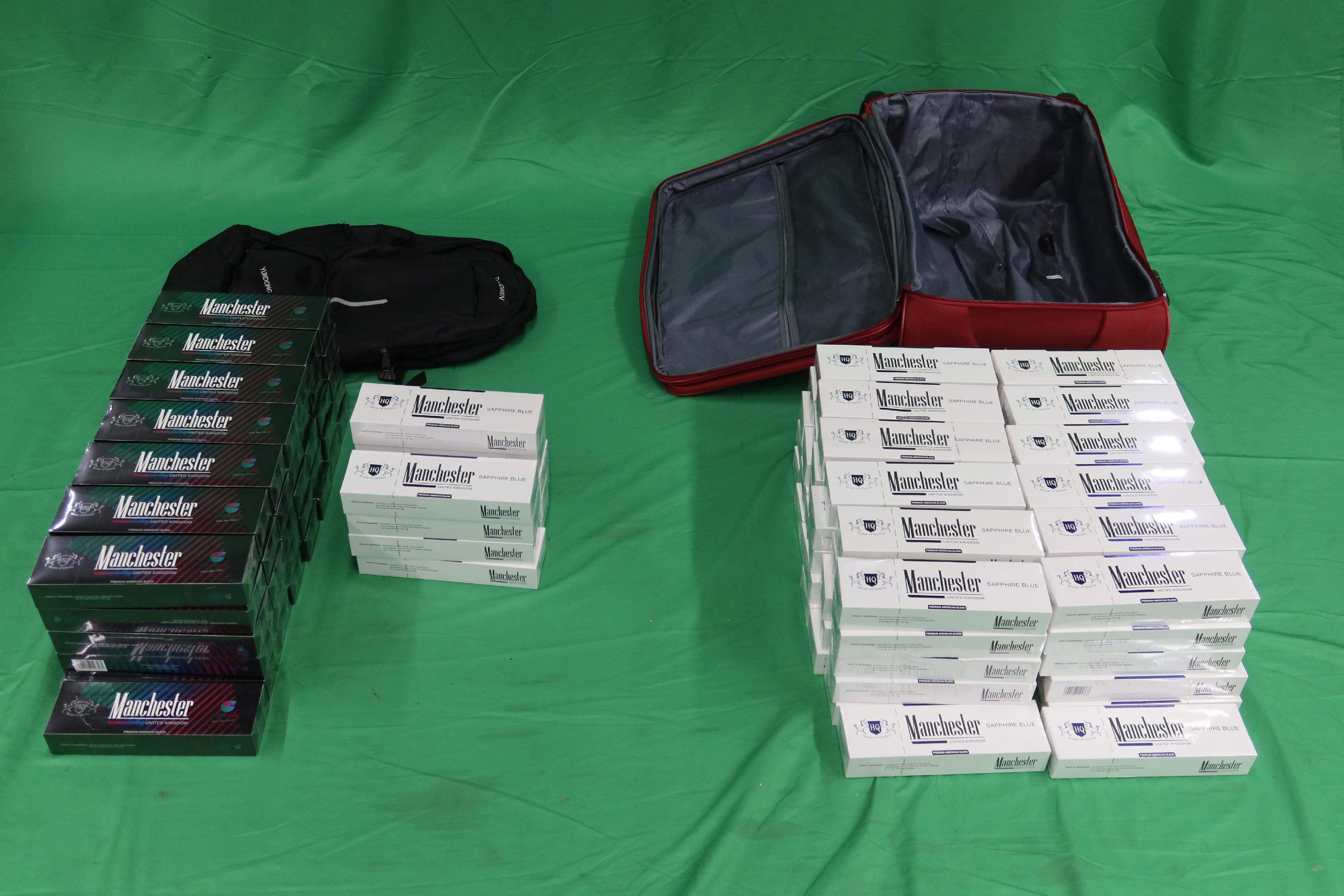 An incoming male passenger was sentenced to four months' imprisonment and fined $1,000 by the West Kowloon Magistrates' Courts today (May 13) for importing duty-not-paid cigarettes and failing to declare them to Customs officers, in contravention of the Dutiable Commodities Ordinance. Photo shows the duty-not-paid cigarettes seized.