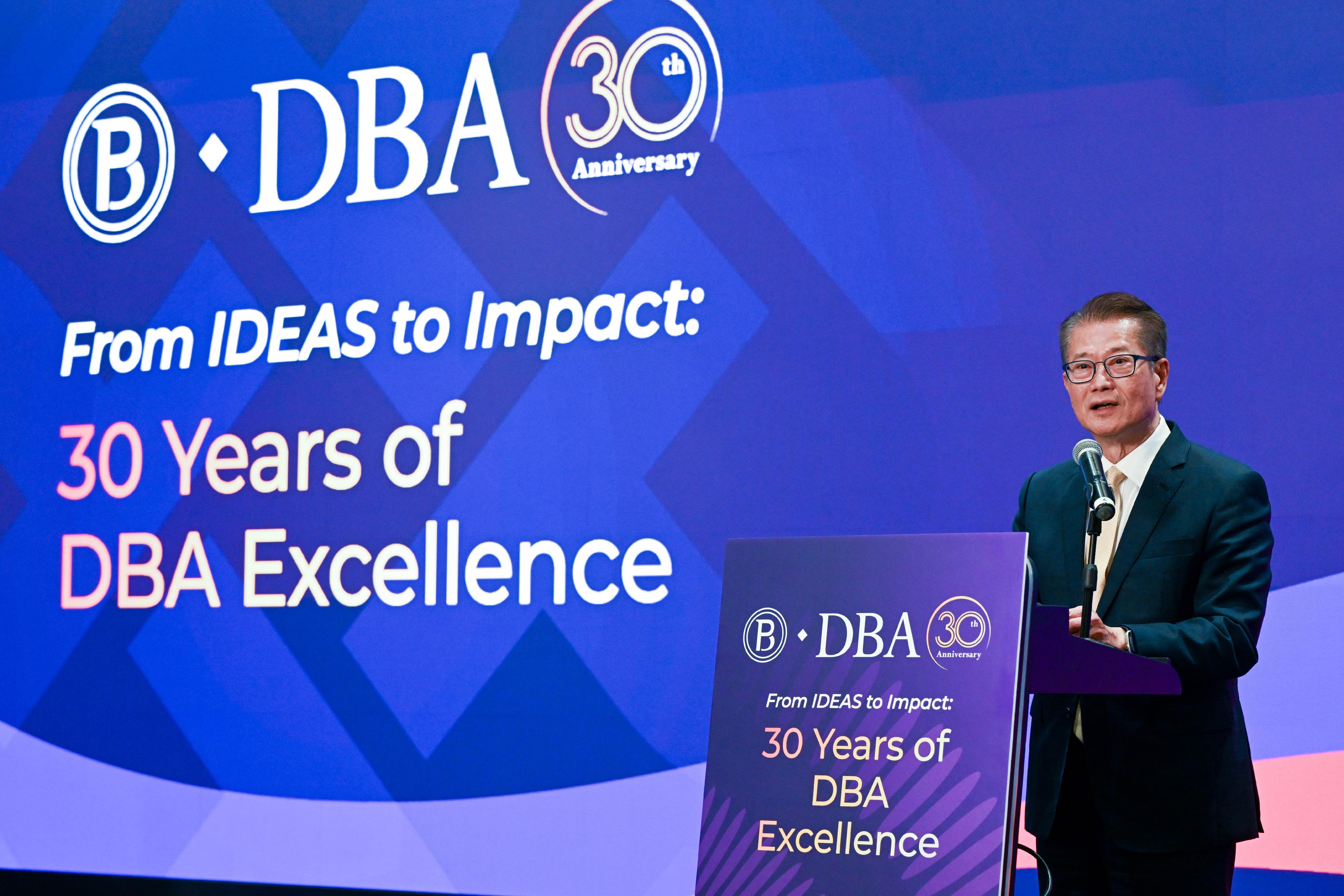 The Financial Secretary, Mr Paul Chan, speaks at the Hong Kong Polytechnic University Doctor of Business Administration 30th Anniversary Dinner today (May 14).