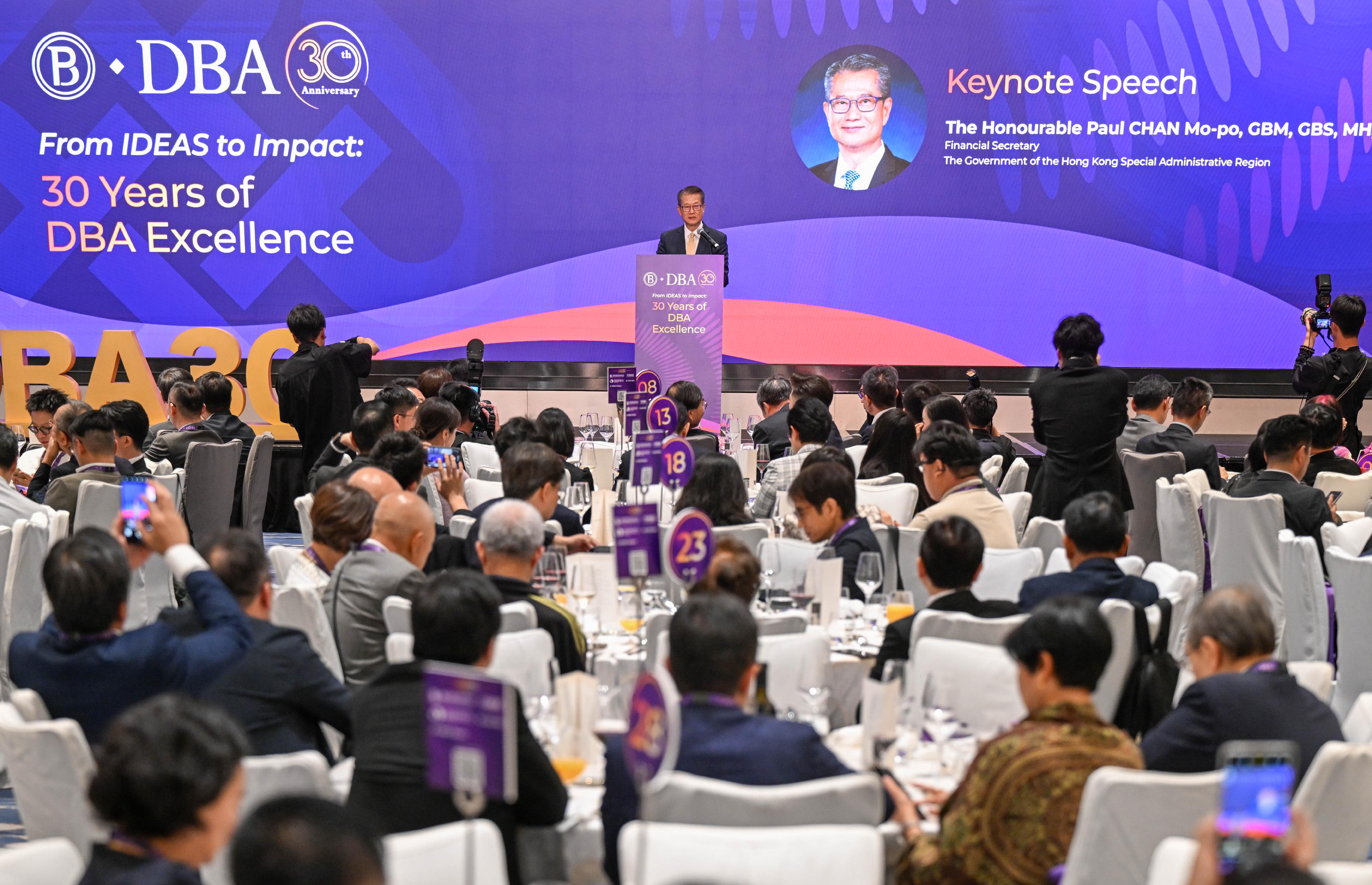The Financial Secretary, Mr Paul Chan, speaks at the Hong Kong Polytechnic University Doctor of Business Administration 30th Anniversary Dinner today (May 14).