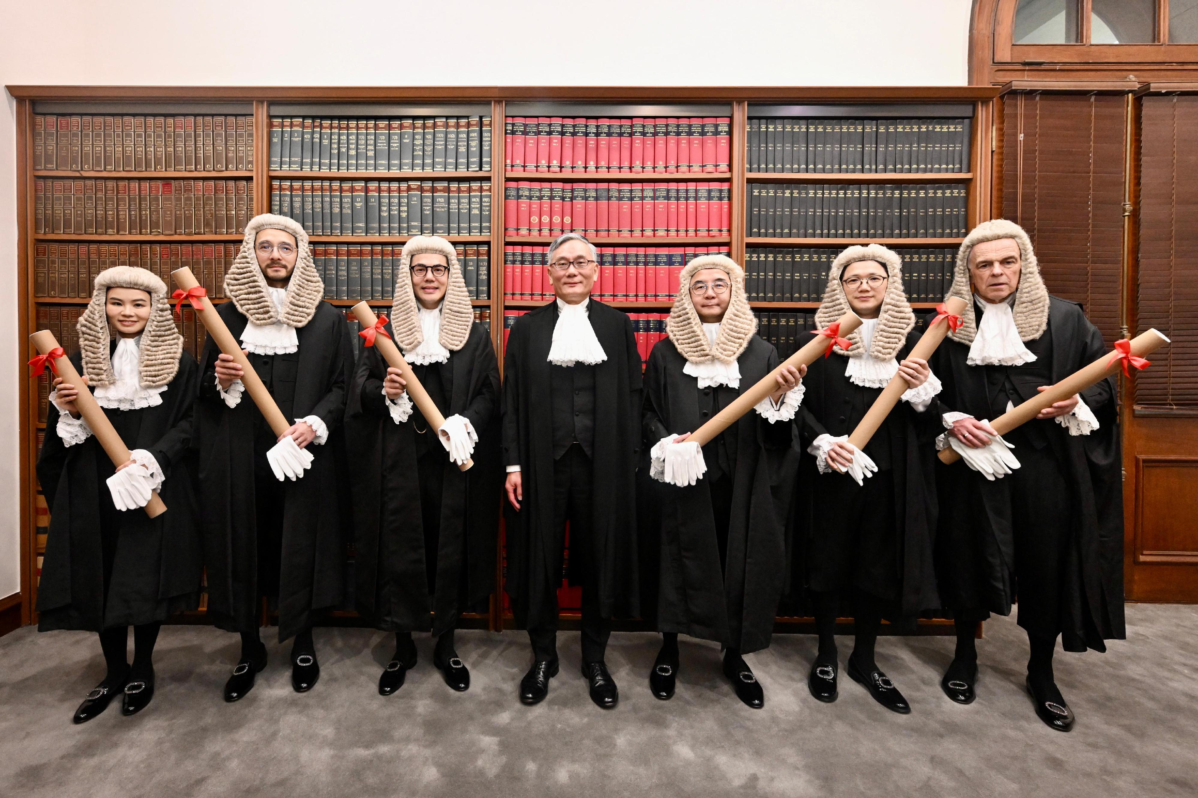 The ceremonial proceedings for the admission of the newly appointed Senior Counsel took place at the Court of Final Appeal today (May 16). Photo shows Chief Justice Andrew Cheung, Chief Justice of the Court of Final Appeal (centre), with the newly appointed Senior Counsel Mr Charles Jeremy Chan (third left); Mr Eugene Yim (third right); Mr Martin Wong (second left); Mr Calvin Cheuk (second right); Ms Bonnie Cheng (first left); and Mr Charles Simon Hollander (first right).