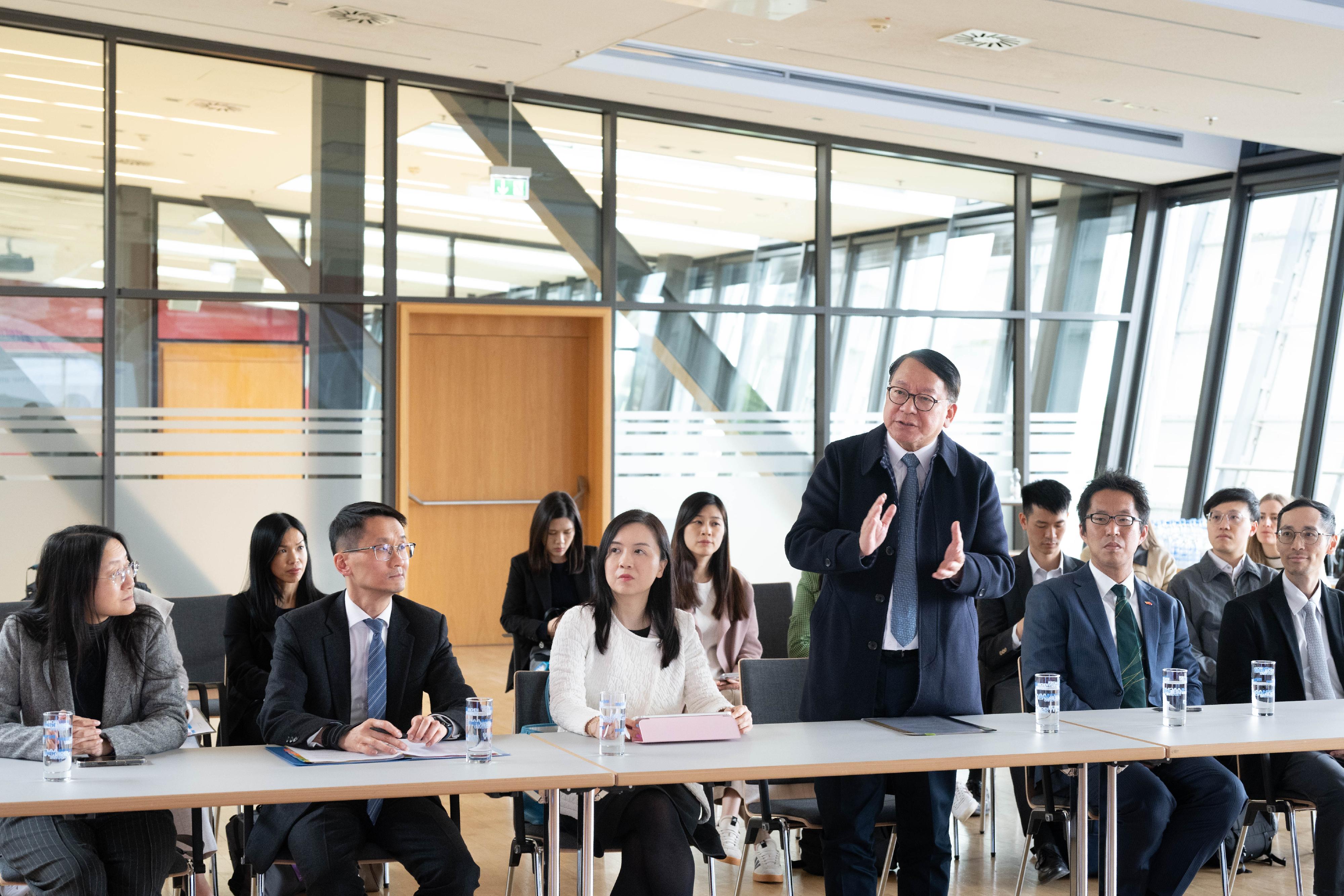 The Chief Secretary for Administration, Mr Chan Kwok-ki, led a delegation of the Working Group on Planning and Construction of the University Town under the Committee on Development of the Northern Metropolis to commence a visit to Germany yesterday (May 18, Aachen time). Photo shows Mr Chan (front row, third right), and the delegation visiting RWTH Aachen University, and meeting with representatives of the university and stakeholders.