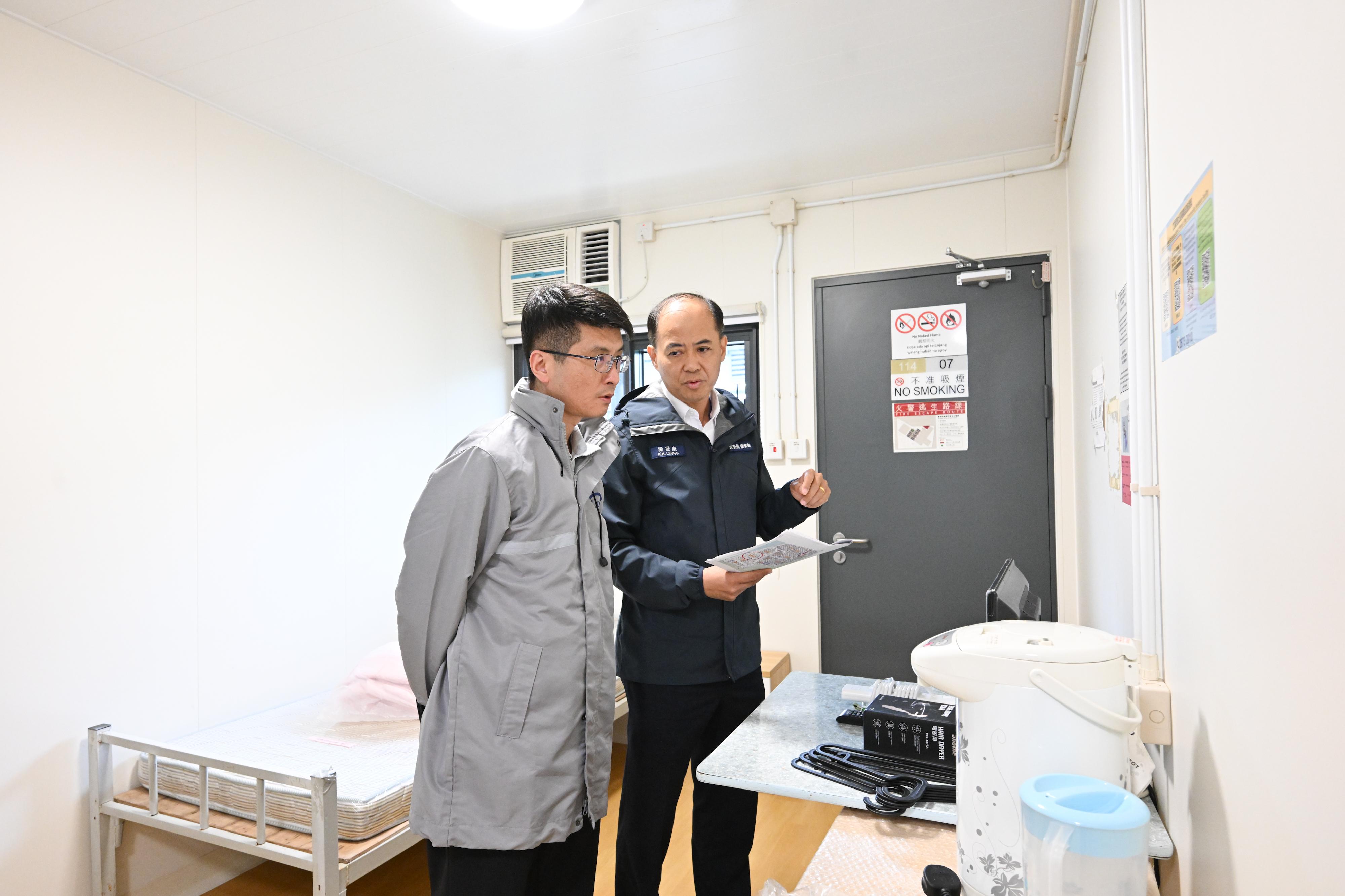 In response to the World Health Organization recently declaring that the Ebola disease epidemic in the Democratic Republic of the Congo and Uganda is a Public Health Emergency of International Concern, the Centre for Health Protection (CHP) of the Department of Health today (May 19) continues to collaborate closely with various stakeholders to implement a series of prevention and control measures, in accordance with the Hong Kong Special Administrative Region Government's Preparedness and Response Plan for Ebola Virus Disease. These measures are intended to guard against imported cases and safeguard public health. Photo shows the Head of the Emergency Response and Programme Management Branch of the CHP, Dr Leung Yiu-hong (left), and the Chief Staff Officer of the Civil Aid Service, Mr Leung Kwun-hong (right), inspecting the Penny's Bay Community Isolation Facility, which has been put into standby mode to ensure that it is ready for use as a quarantine facility should the need arise.