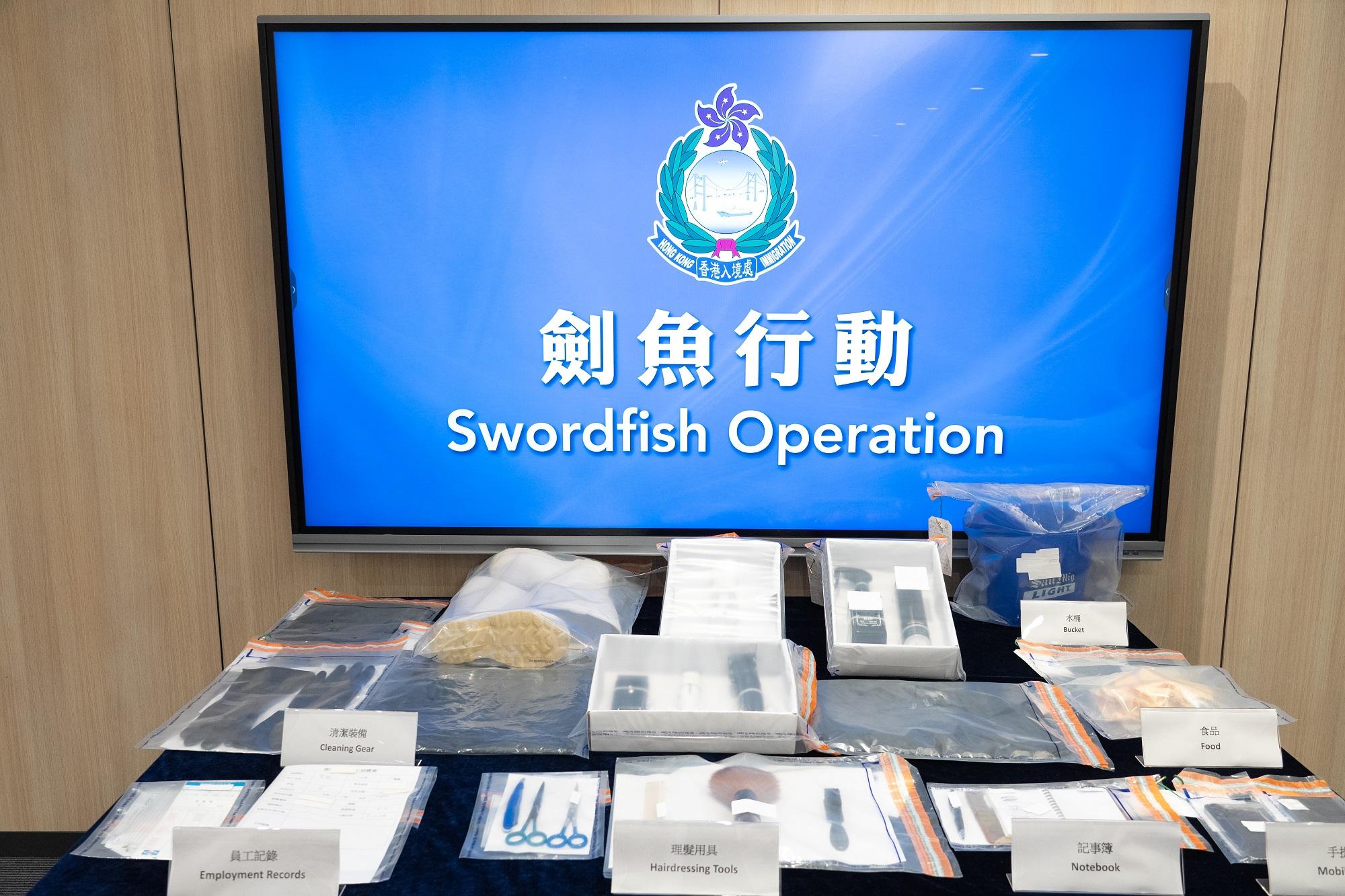 The Immigration Department conducted a series of territory-wide anti-illegal worker operations codenamed "Swordfish" for three consecutive days from May 17 to 19. Photo shows the items seized during the operations.