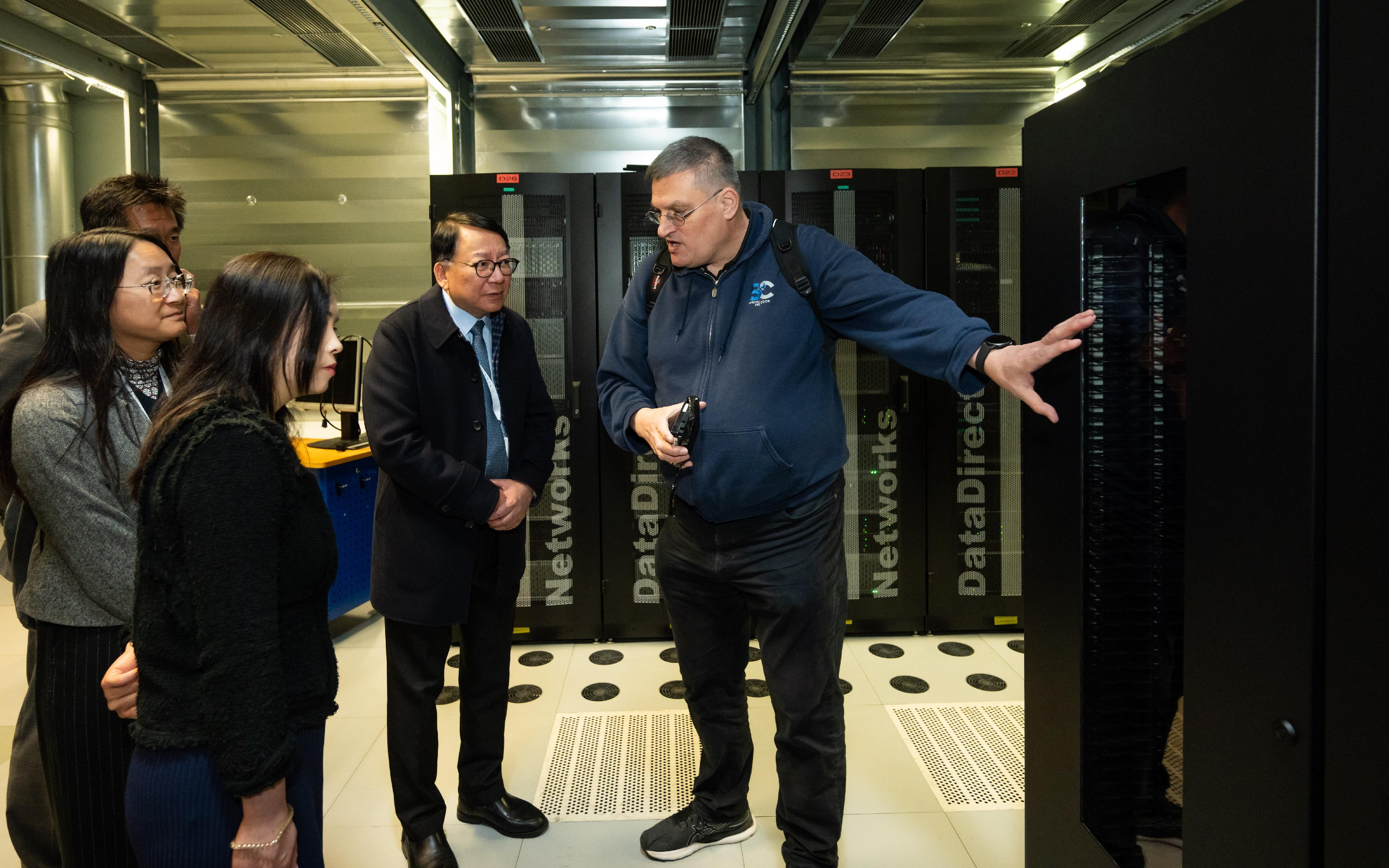 The Chief Secretary for Administration, Mr Chan Kwok-ki, led the delegation of the Working Group on Planning and Construction of the University Town under the Committee on Development of the Northern Metropolis to continue its trip to Germany yesterday (May 19, Stuttgart time). Photo shows Mr Chan (second right), and the delegation touring the High-Performance Computing Center Stuttgart on the campus of the University of Stuttgart.