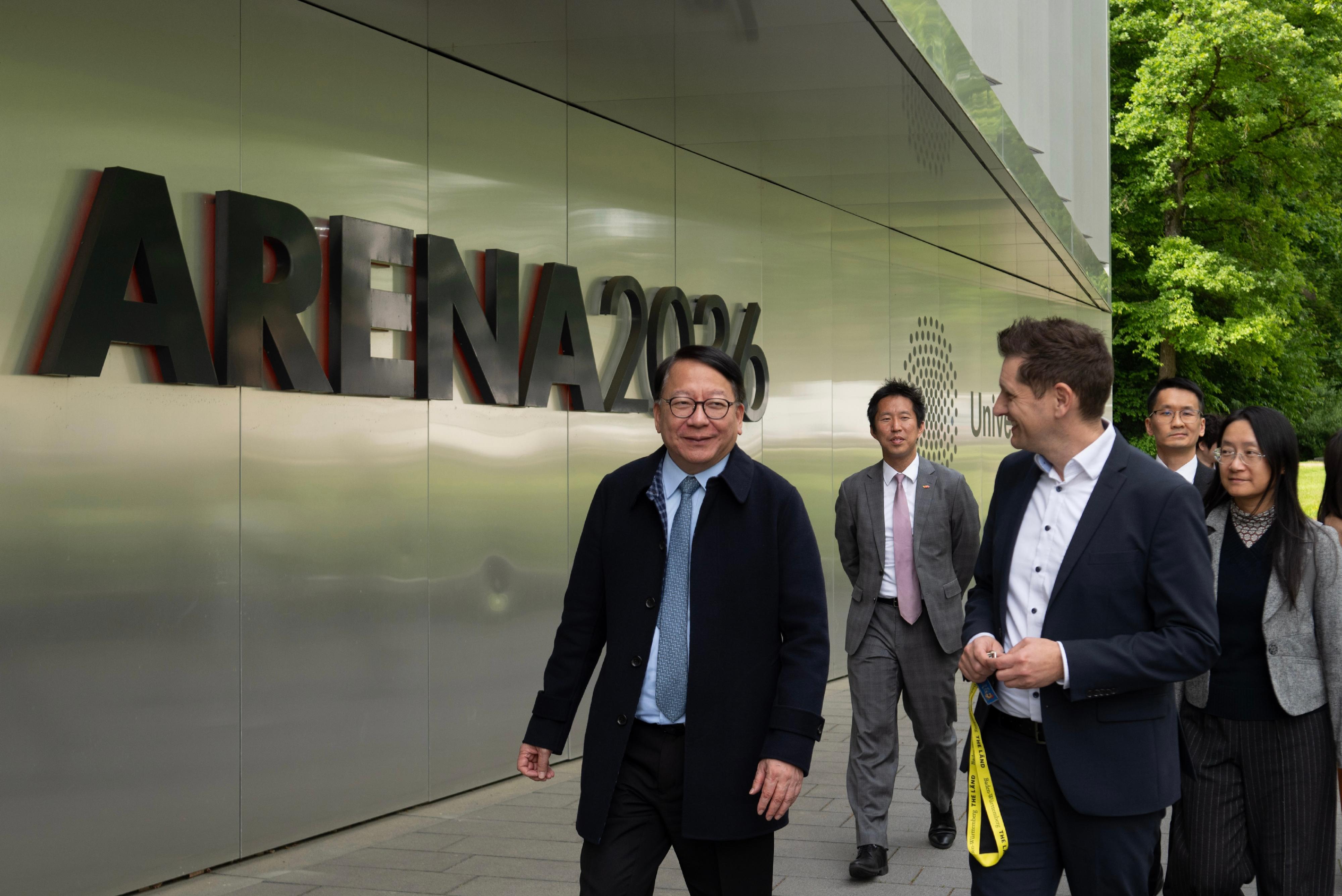 The Chief Secretary for Administration, Mr Chan Kwok-ki, led the delegation of the Working Group on Planning and Construction of the University Town under the Committee on Development of the Northern Metropolis to continue its trip to Germany yesterday (May 19, Stuttgart time). Photo shows Mr Chan (first left), and the delegation visiting the ARENA2036 research campus for automobiles on the campus of the University of Stuttgart, and meeting with university representatives.