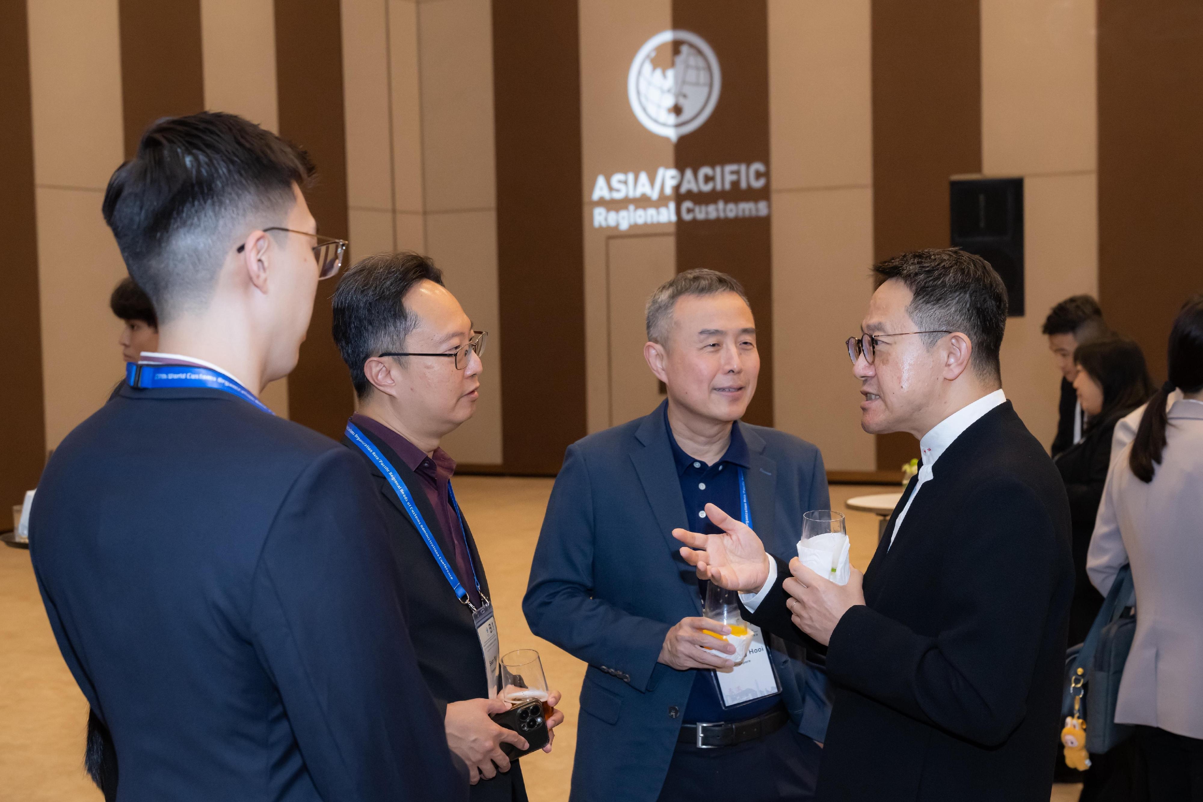 The 27th World Customs Organization Asia/Pacific Regional Heads of Customs Administrations Conference held by Hong Kong Customs concluded today (May 20). Photo shows the Commissioner of Customs and Excise, Mr Chan Tsz-tat (first right), mingling with participants of the Conference.