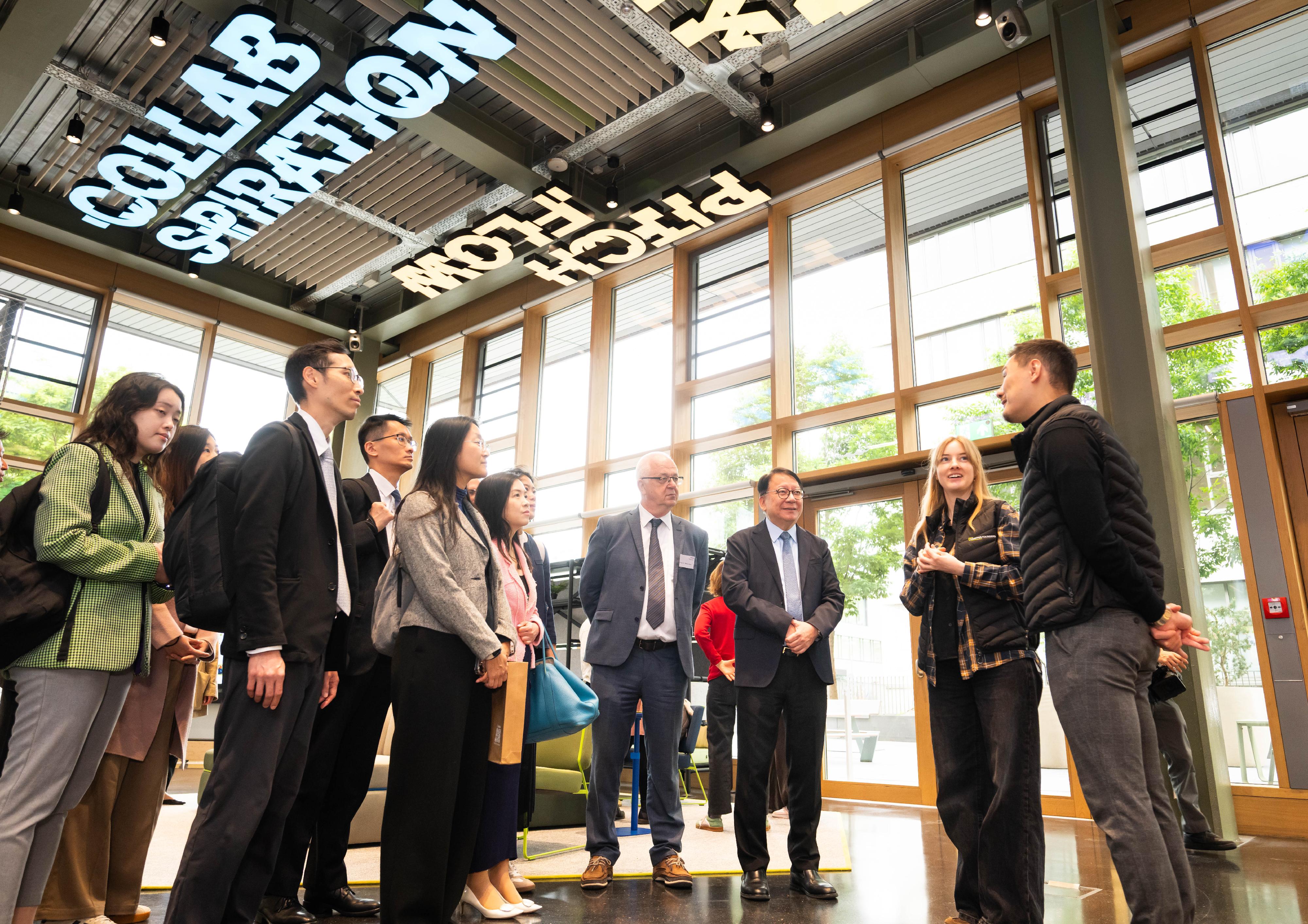 The delegation of the Working Group on Planning and Construction of the University Town under the Committee on Development of the Northern Metropolis led by the Chief Secretary for Administration, Mr Chan Kwok-ki, yesterday (May 20, Heilbronn time) continued its visit to Germany. Photo shows Mr Chan (third right) and the delegation touring the facilities of Bildungscampus Heilbronn, including Campus Founders, a start-up and co-innovation hub.