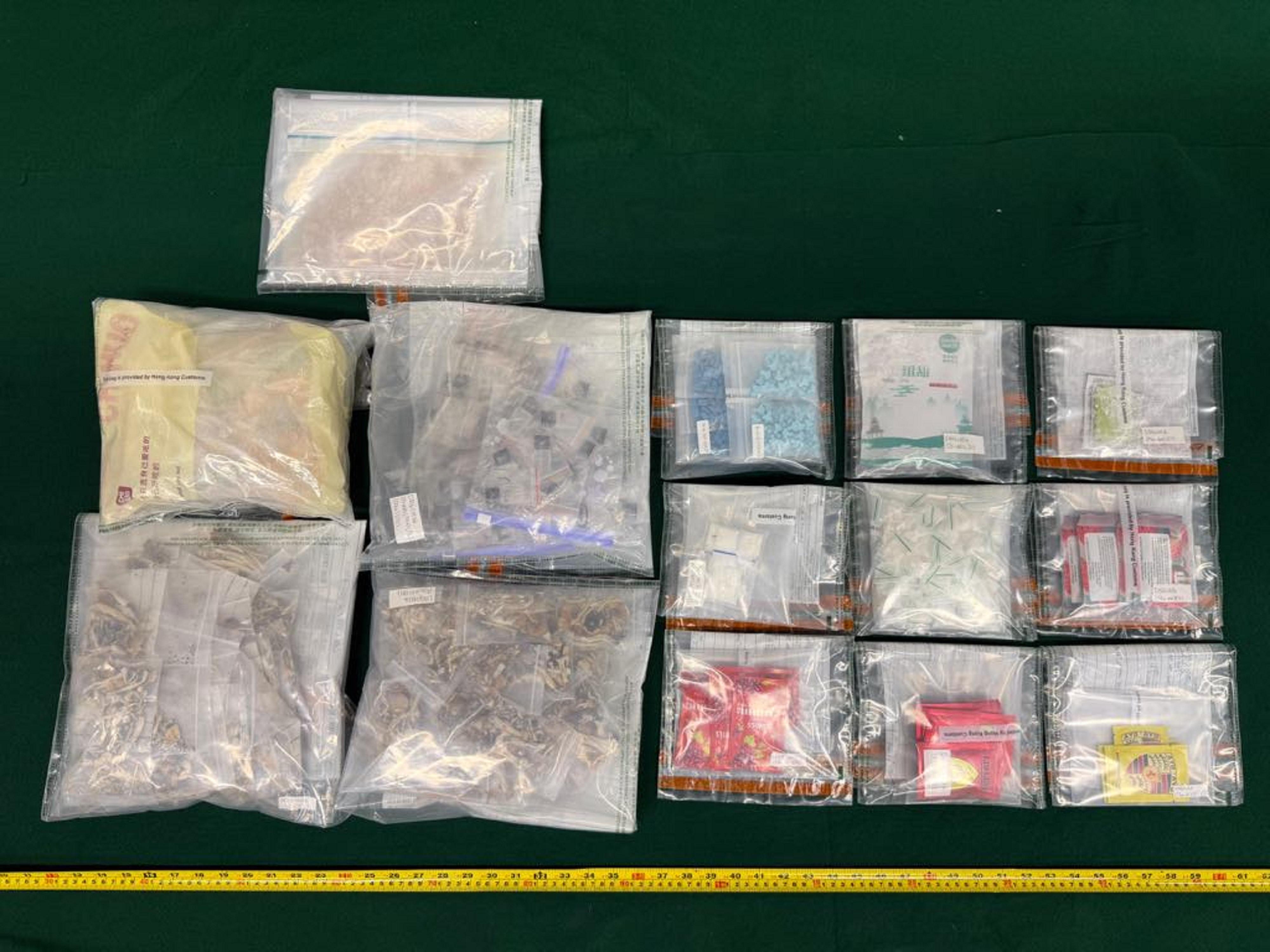Hong Kong Customs detected two dangerous drugs cases in Tseung Kwan O and Hong Kong International Airport respectively yesterday (May 21) and today (May 22), and seized a total of about 21.8 kilograms of assorted drugs with a total estimated market value of about $7.95 million. Photo shows the suspected assorted drugs seized in the first case.