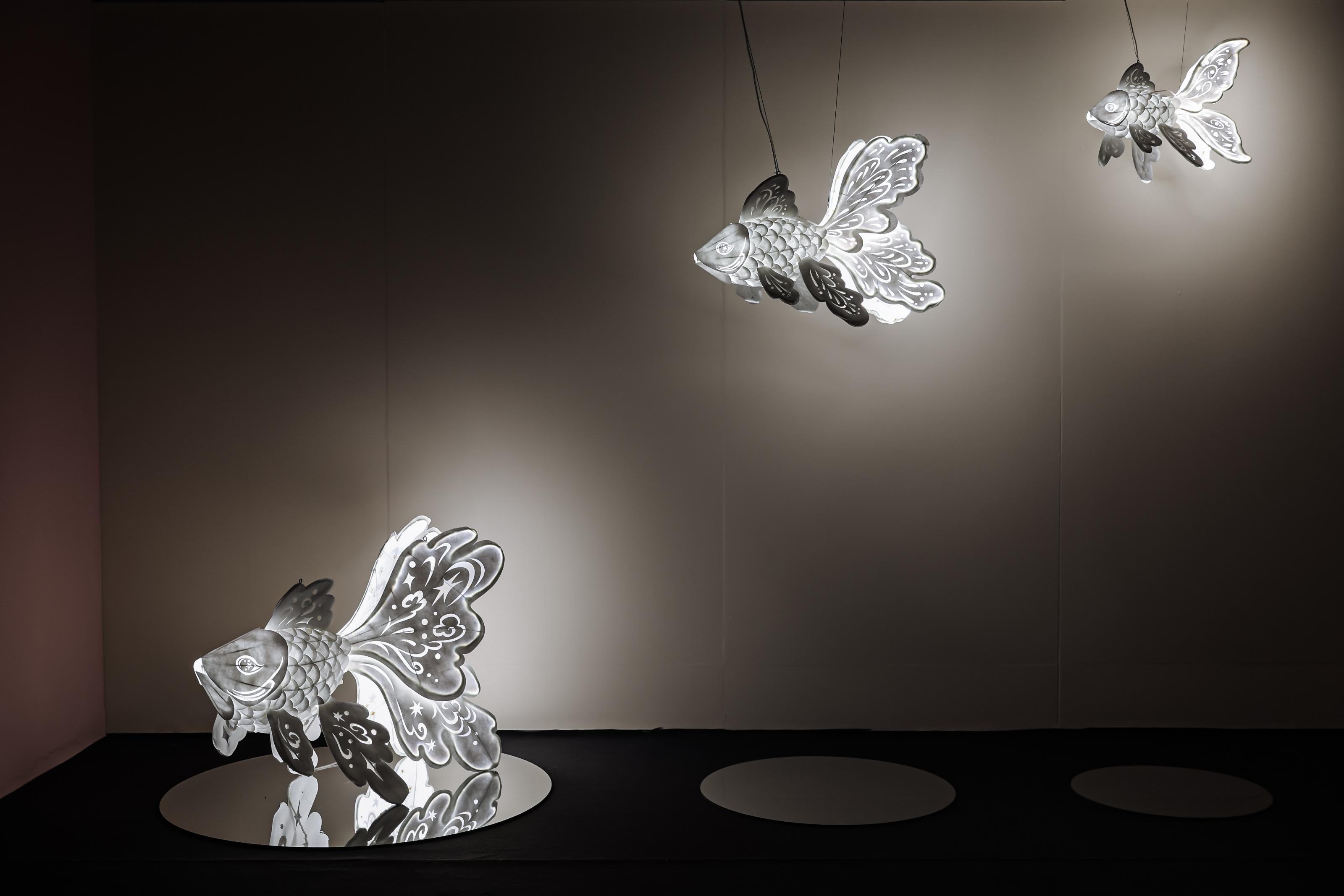 Jointly organised by the Art Promotion Office and the Shenzhen Fringe Art Center, the fifth exhibition "Illusory Landscapes" of the "Ink Art Ensembles" Exhibition Series in the Greater Bay Area (GBA) is on display until July 12 at the Guancheng Art Museum in Dongguan. Photo shows GBA artist Wen Qiuwen's artwork "Fish of the Mountains and Seas", where the fish is constructed from metal armatures and covered with paper. Its forms contain internal light sources, with light flickering through the structure, tracing indistinct contours.