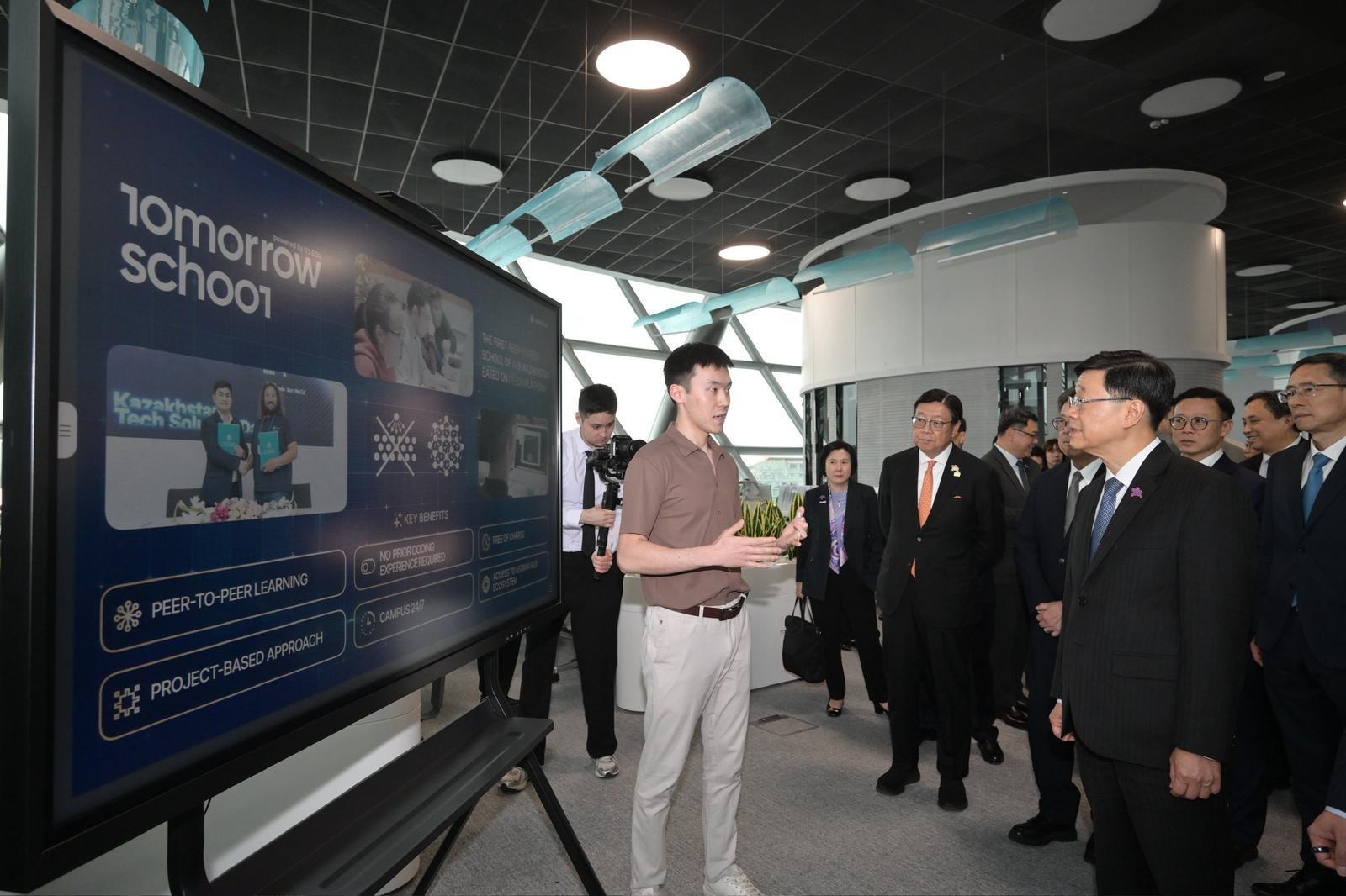 The Chief Executive, Mr John Lee (front row, right), today (June 1, Astana time) visits the Astana Hub to learn about the latest developments of Kazakhstan in the field of AI.