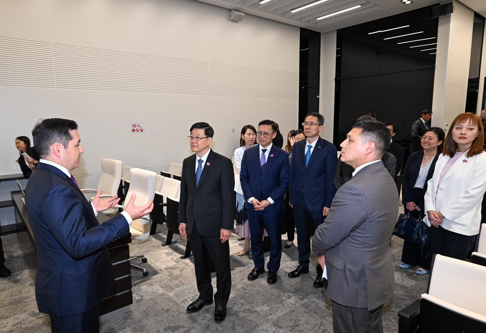 The Chief Executive, Mr John Lee (second left), today (June 1, Astana time) visits the Astana International Financial Centre to learn about Kazakhstan's experience in promoting the development of the non-banking financial sector.