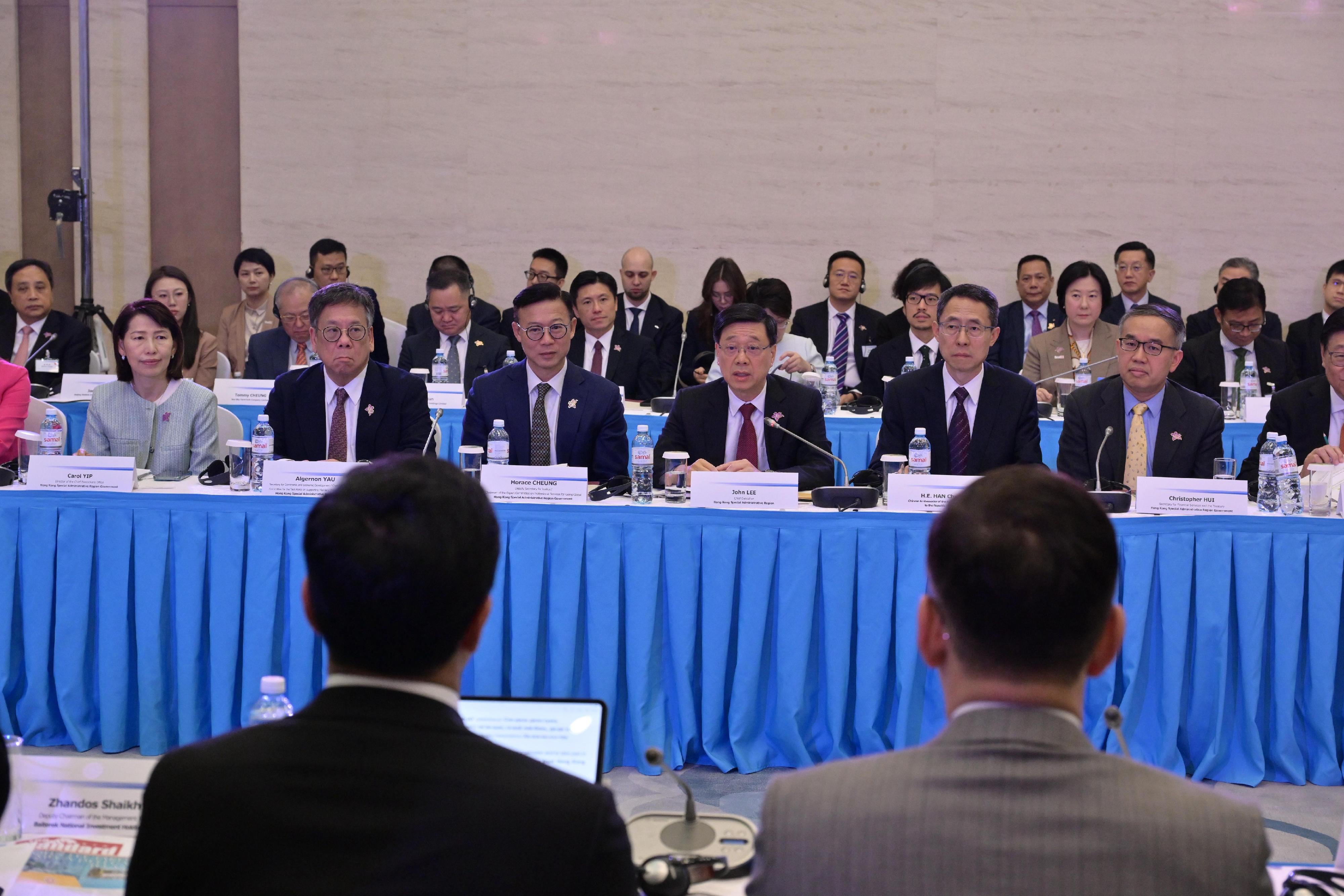 The Chief Executive, Mr John Lee, attends a meeting with Baiterek National Investment Holding in Astana, Kazakhstan, today (June 2, Astana time). Photo shows (from first left) the Director of the Chief Executive's Office, Ms Carol Yip; the Secretary for Commerce and Economic Development, Mr Algernon Yau; the Deputy Secretary for Justice, Dr Cheung Kwok-kwan; Mr Lee; the Ambassador Extraordinary and Plenipotentiary of the People's Republic of China to the Republic of Kazakhstan, Mr Han Chunlin; and the Secretary for Financial Services and the Treasury, Mr Christopher Hui, in the meeting with the company.