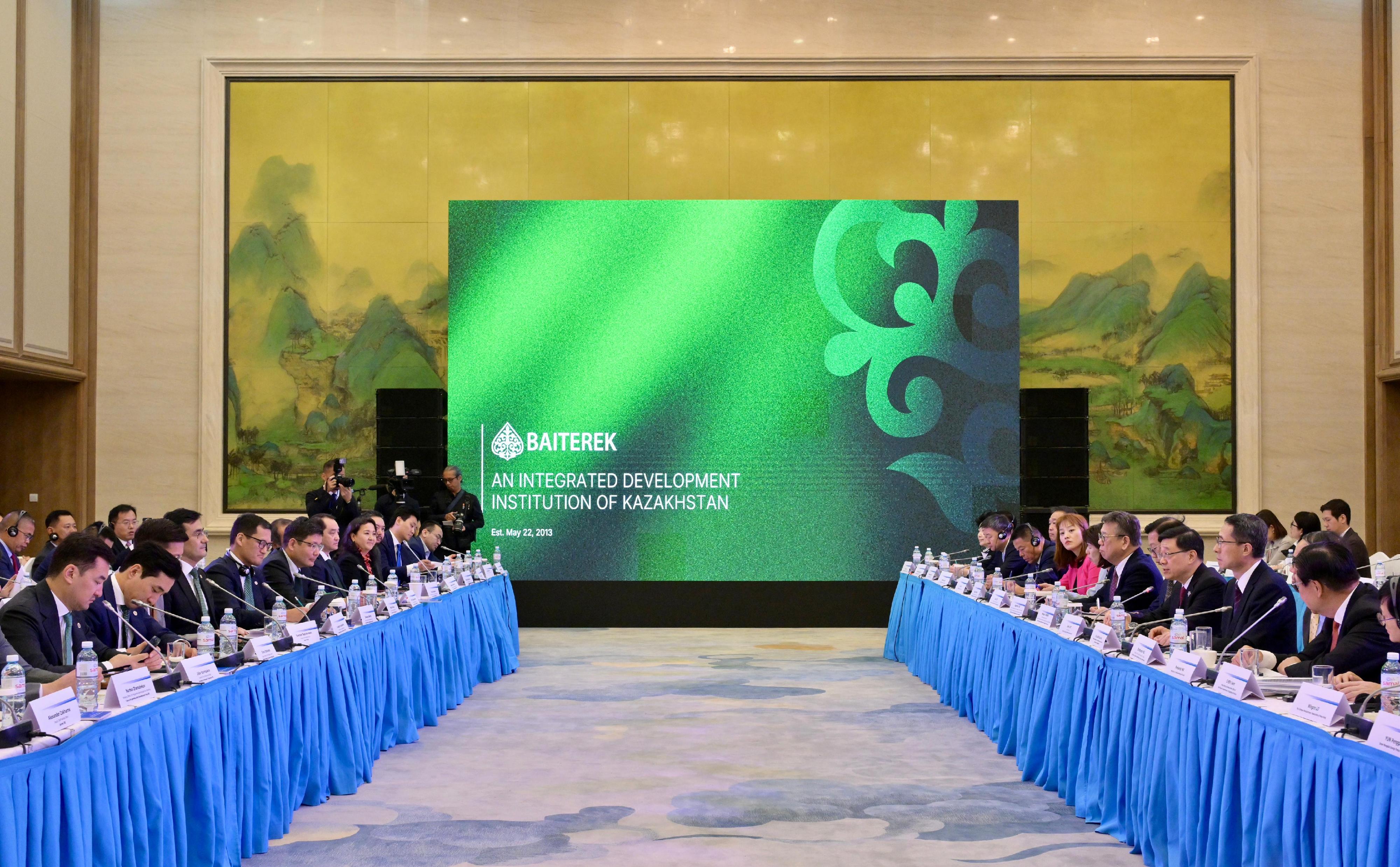 The Chief Executive, Mr John Lee (fourth right), attends a meeting with Baiterek National Investment Holding and meets with the Chairman of the Board of Baiterek, Mr Rustam Timurovich Karagoishin (fourth left) in Astana, Kazakhstan, today (June 2, Astana time).