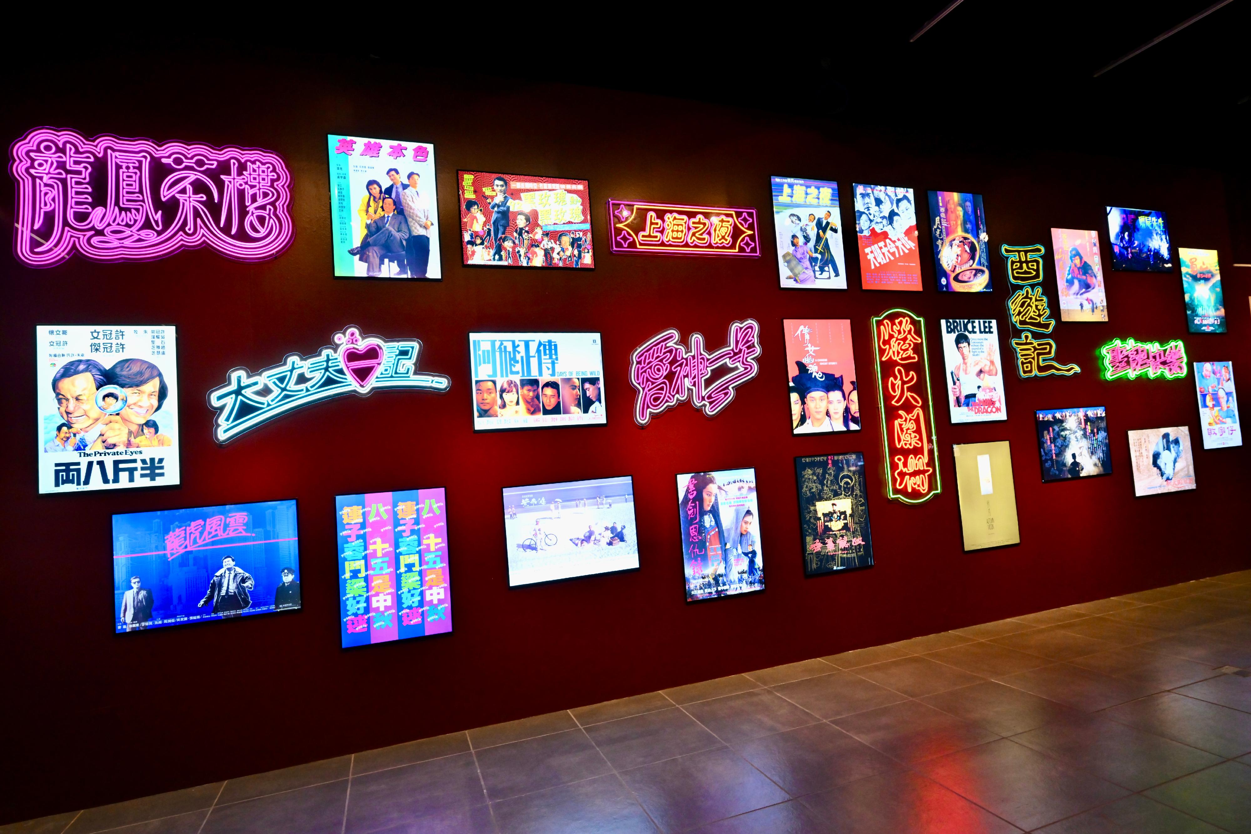 The "Hong Kong Film Archive Stories: Treasure Hunting for 25 Years" exhibition, presented by the Hong Kong Film Archive, will be staged at the Hong Kong Heritage Museum starting from tomorrow (June 3). Photo shows a poster wall, where visitors can take pictures with classic film posters mixed with neon light signs of film titles. 