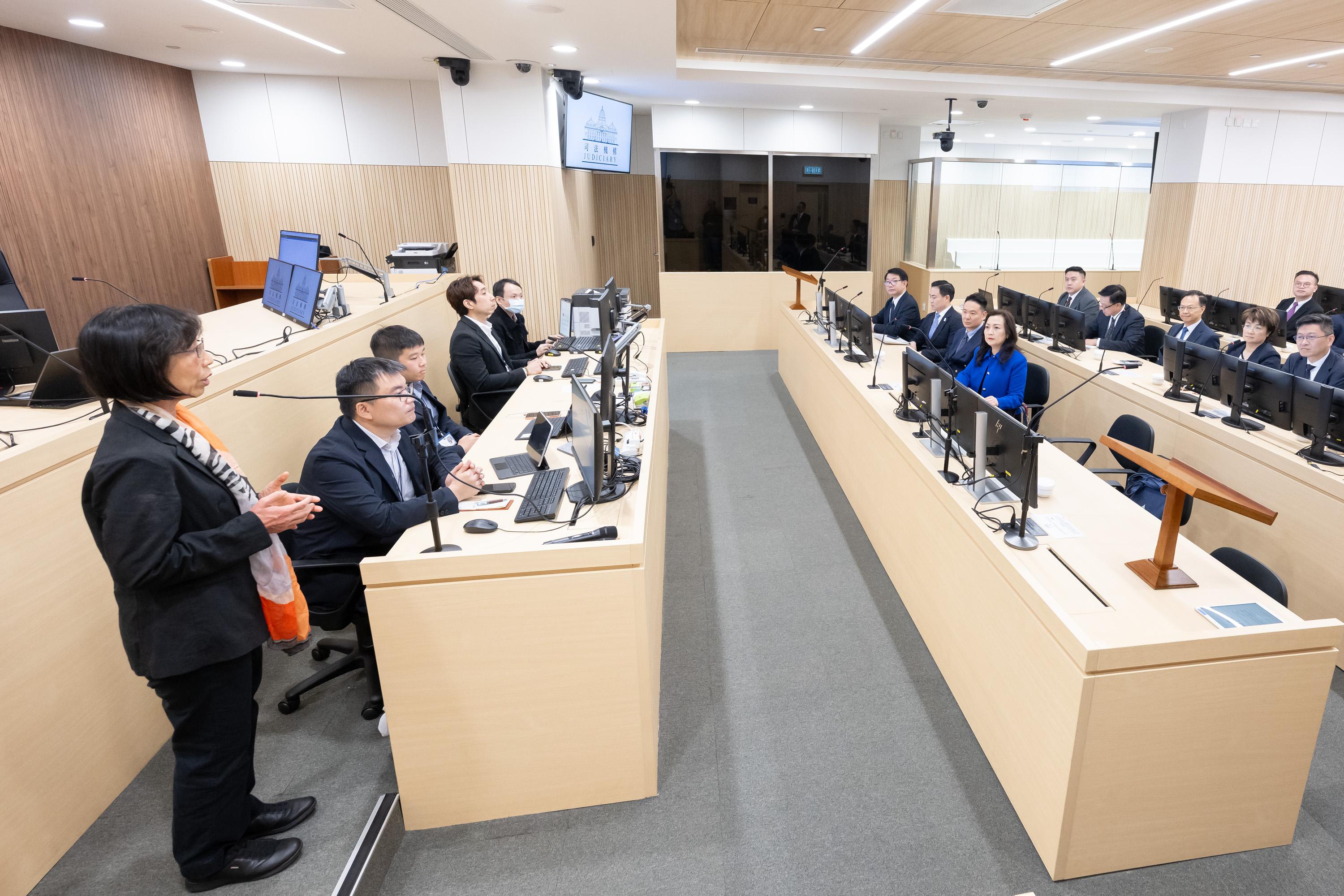 Legislative Council Members receive a briefing today (June 2) from the Judiciary Administrator, Ms Esther Leung, on the latest construction progress of the new District Court Building on Caroline Hill Road, Causeway Bay.