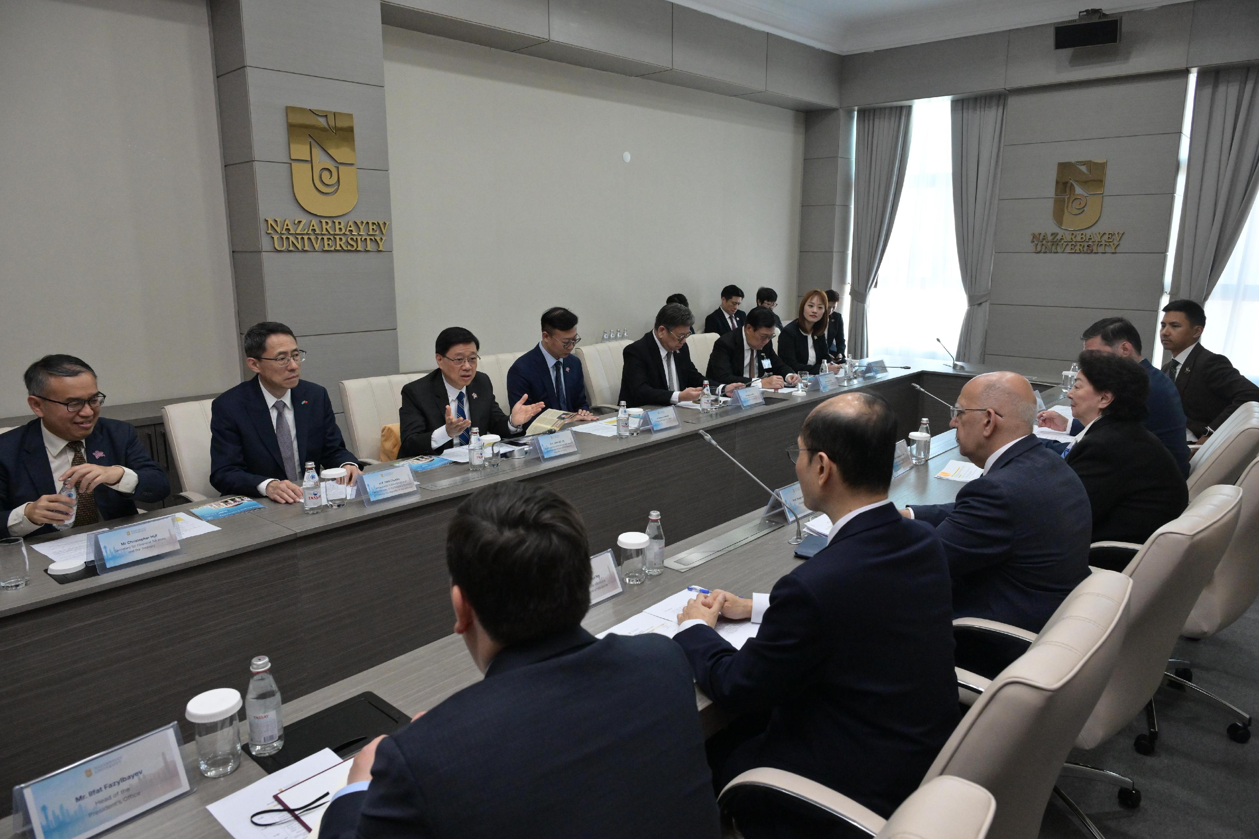 The Chief Executive, Mr John Lee, today (June 3), visited Nazarbayev University in Astana, Kazakhstan. Photo shows Mr Lee (third left) meeting with the President of Nazarbayev University, Professor Waqar Ahmad (fourth right), to exchange views on strengthening co-operation in higher education between the two places.