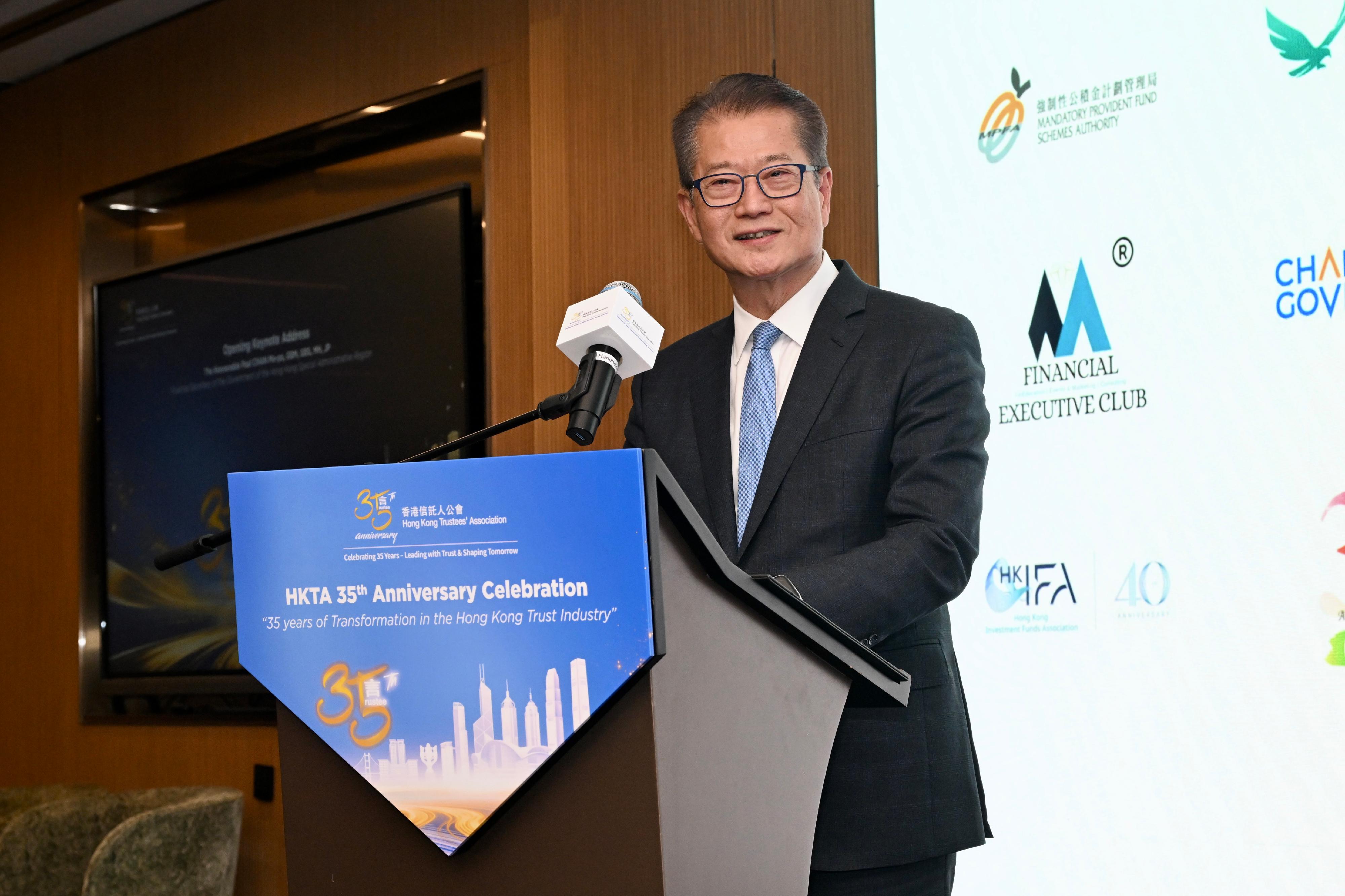 The Financial Secretary, Mr Paul Chan, speaks at the HKTA 35th Anniversary Conference today (June 3).