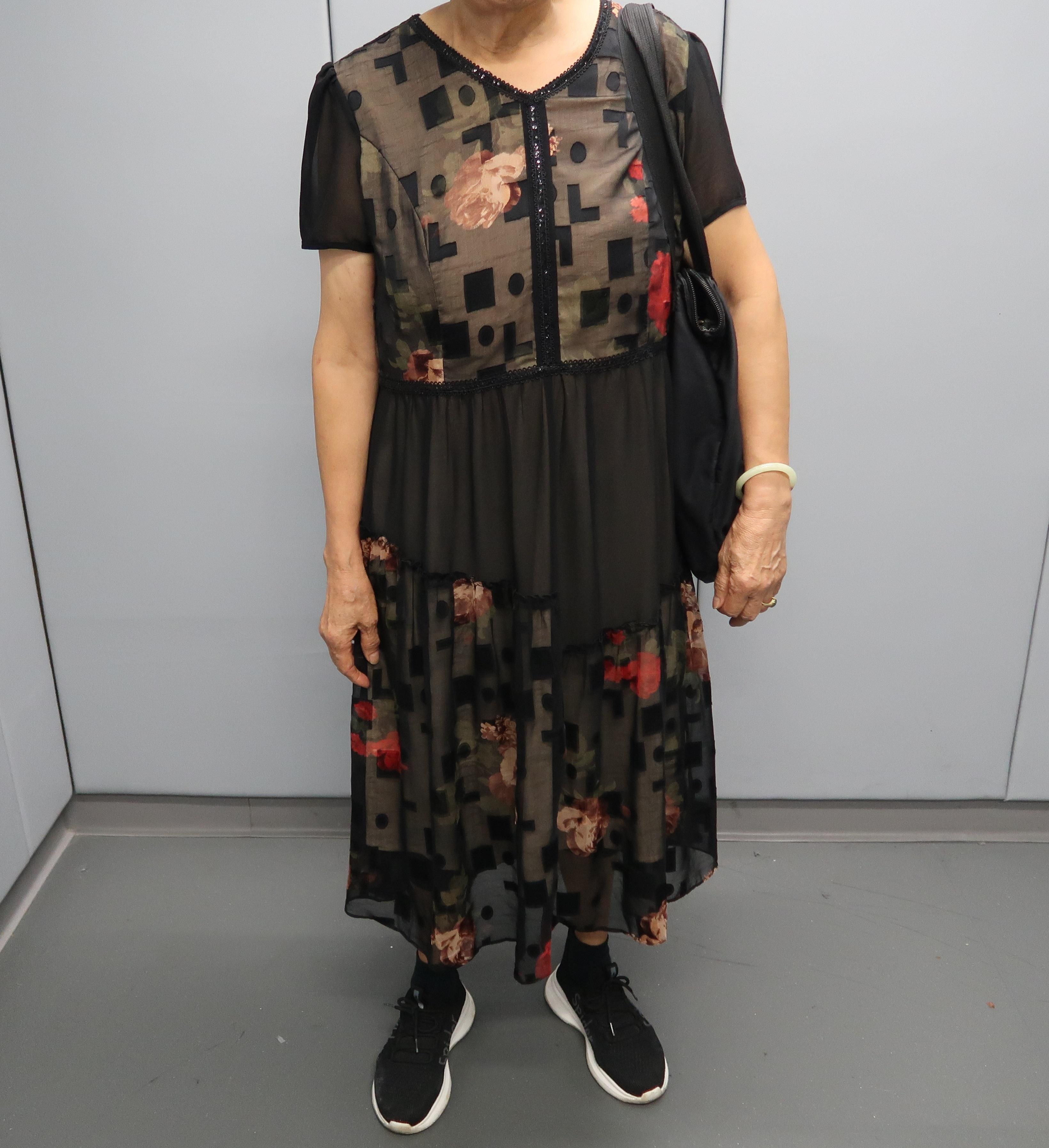 An incoming passenger was sentenced to four weeks' imprisonment with a fine of $1,000 by the Fanling Magistrates' Courts today (June 4) for possessing duty-not-paid cigarettes and failing to declare them to Customs officers, in contravention of the Dutiable Commodities Ordinance. Photo shows the 74-year-old incoming female passenger concealing duty-not-paid cigarettes around her thighs and calves covered by a dress.