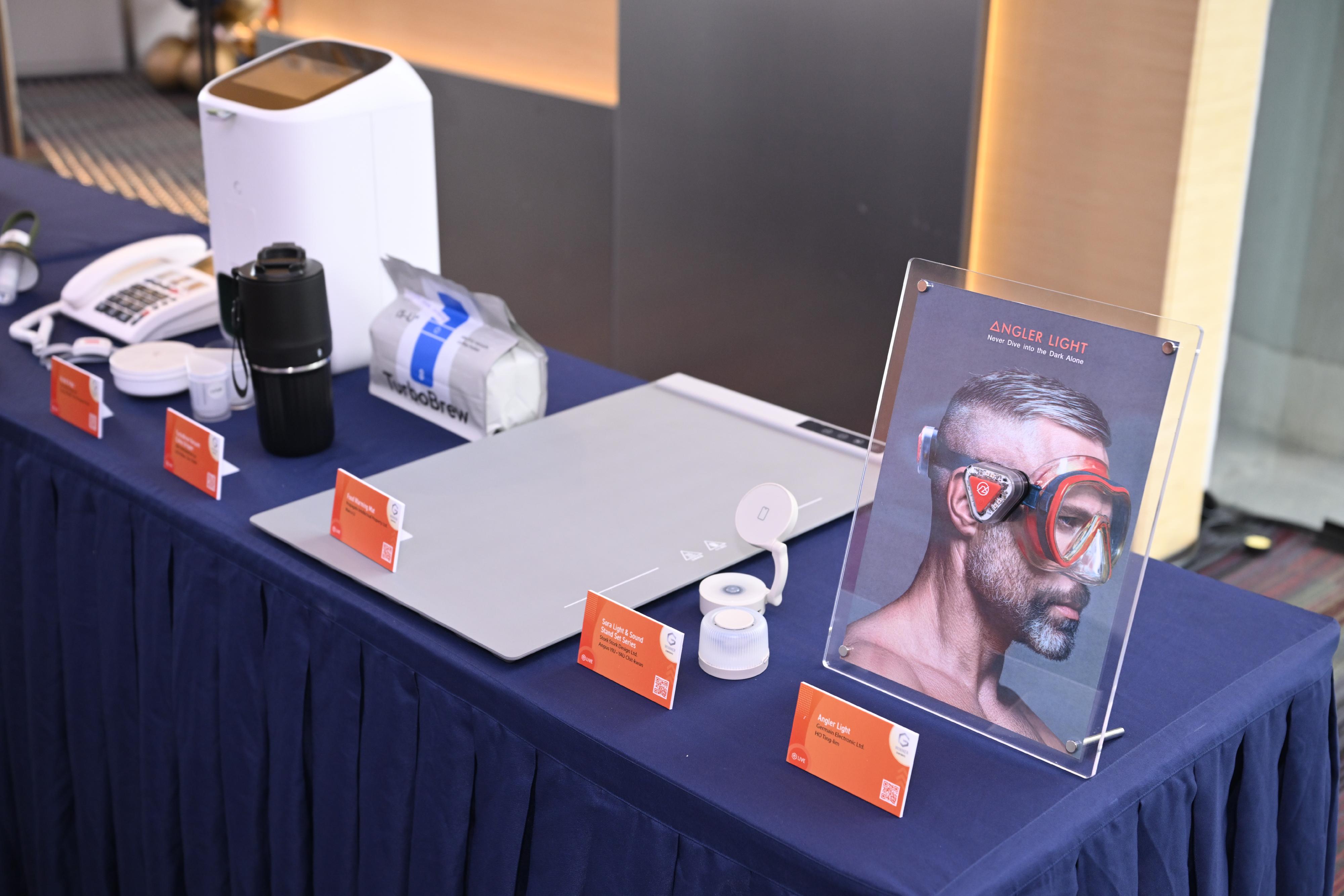 Sponsored by the Cultural and Creative Industries Development Agency under the Culture, Sports and Tourism Bureau and organised by the Hong Kong Exporters' Association, the Smart Design Global 2026 Awards Presentation Ceremony was held today (June 5) at the Charles K Kao Auditorium of Hong Kong Science Park.  Photo shows the awarded designs and products at the venue.