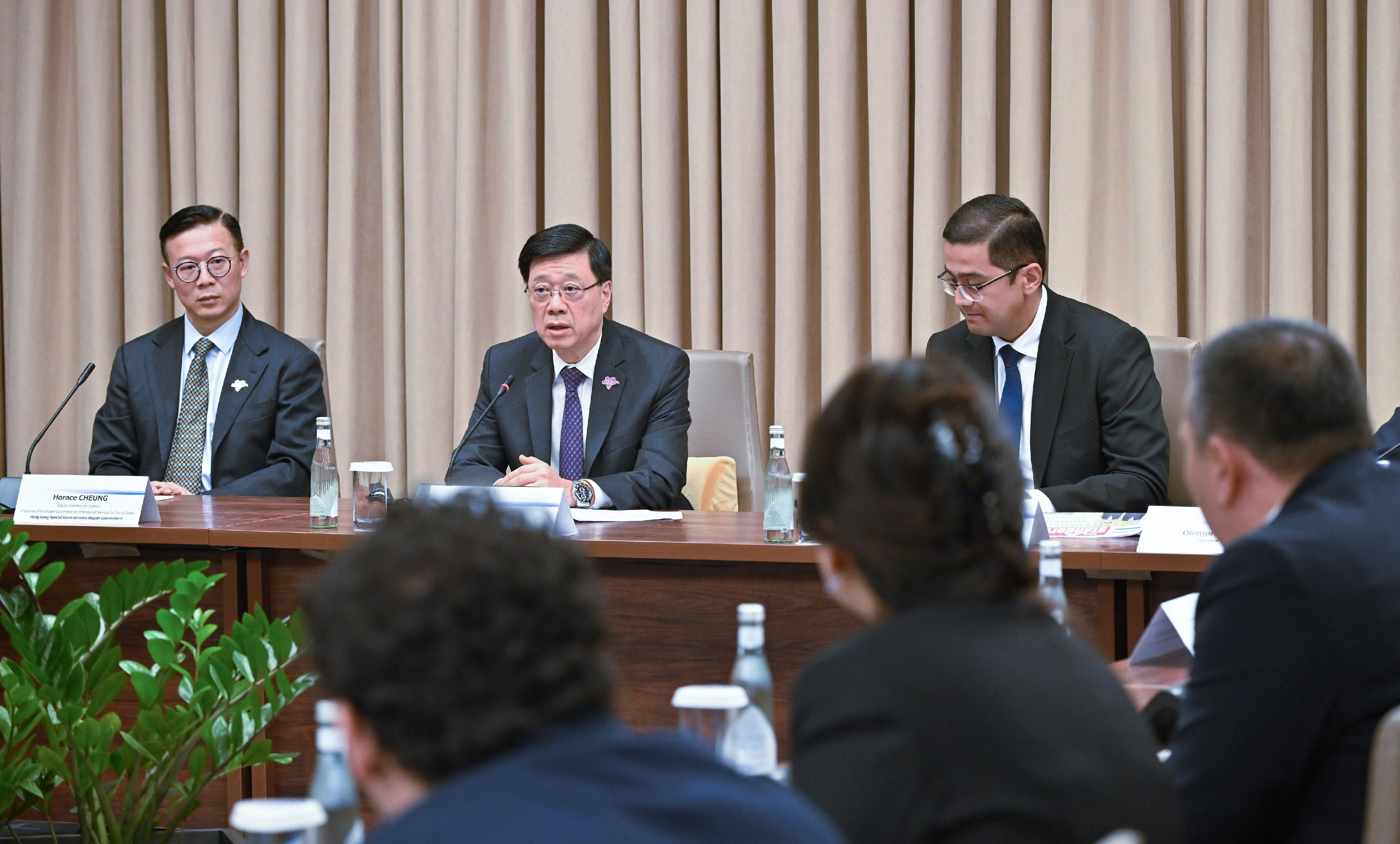 The Chief Executive, Mr John Lee, today (June 5) visited the IT Park in Tashkent, Uzbekistan. Photo shows Mr Lee (centre) meeting with the First Deputy Minister of Digital Technologies of Uzbekistan, Mr Ayubkhon Sultonov (right). Looking on is the the Deputy Secretary for Justice, Dr Cheung Kwok-kwan (left).